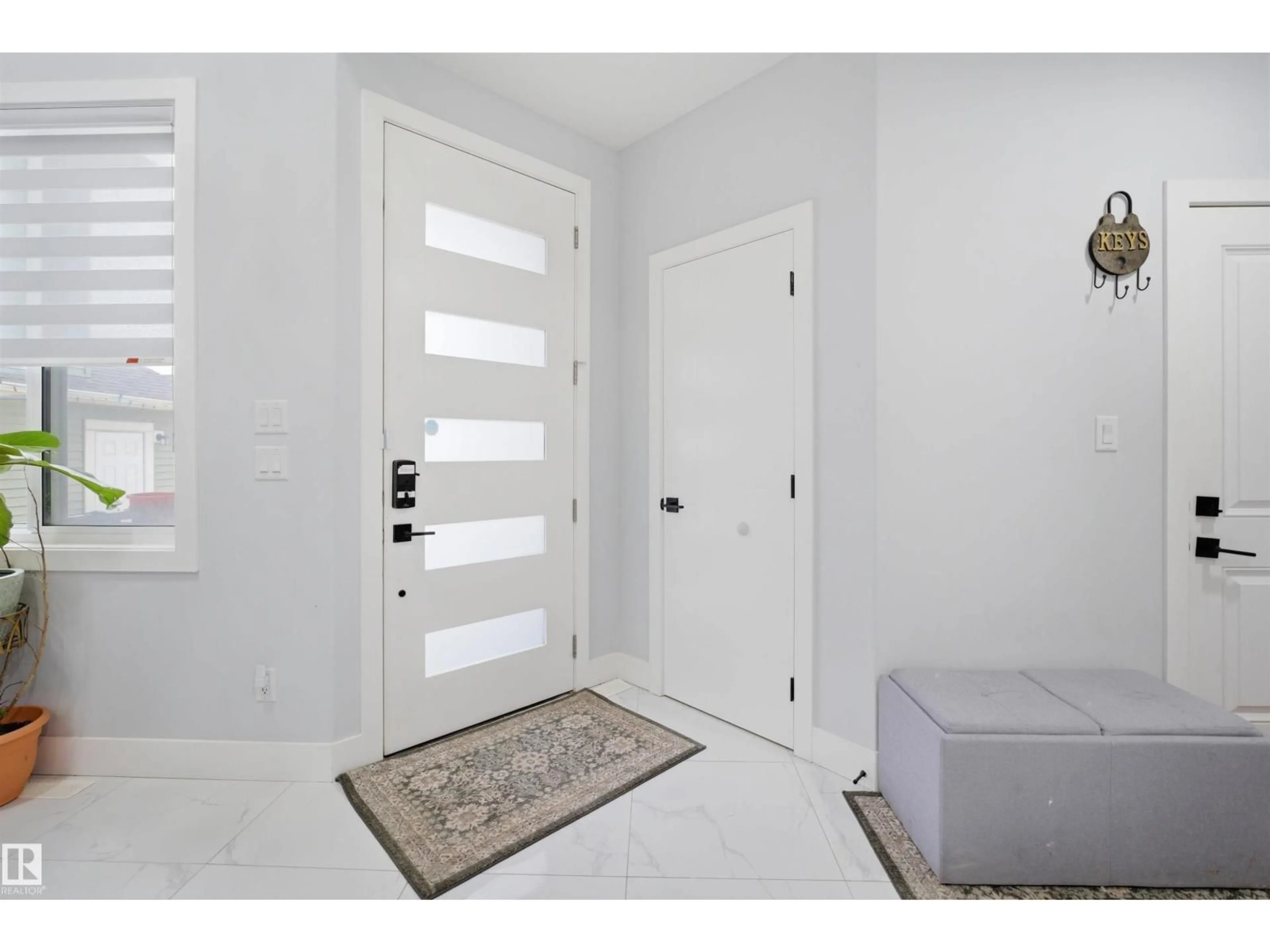 Indoor entryway for 2420 13 AV, Edmonton Alberta T6T2M7