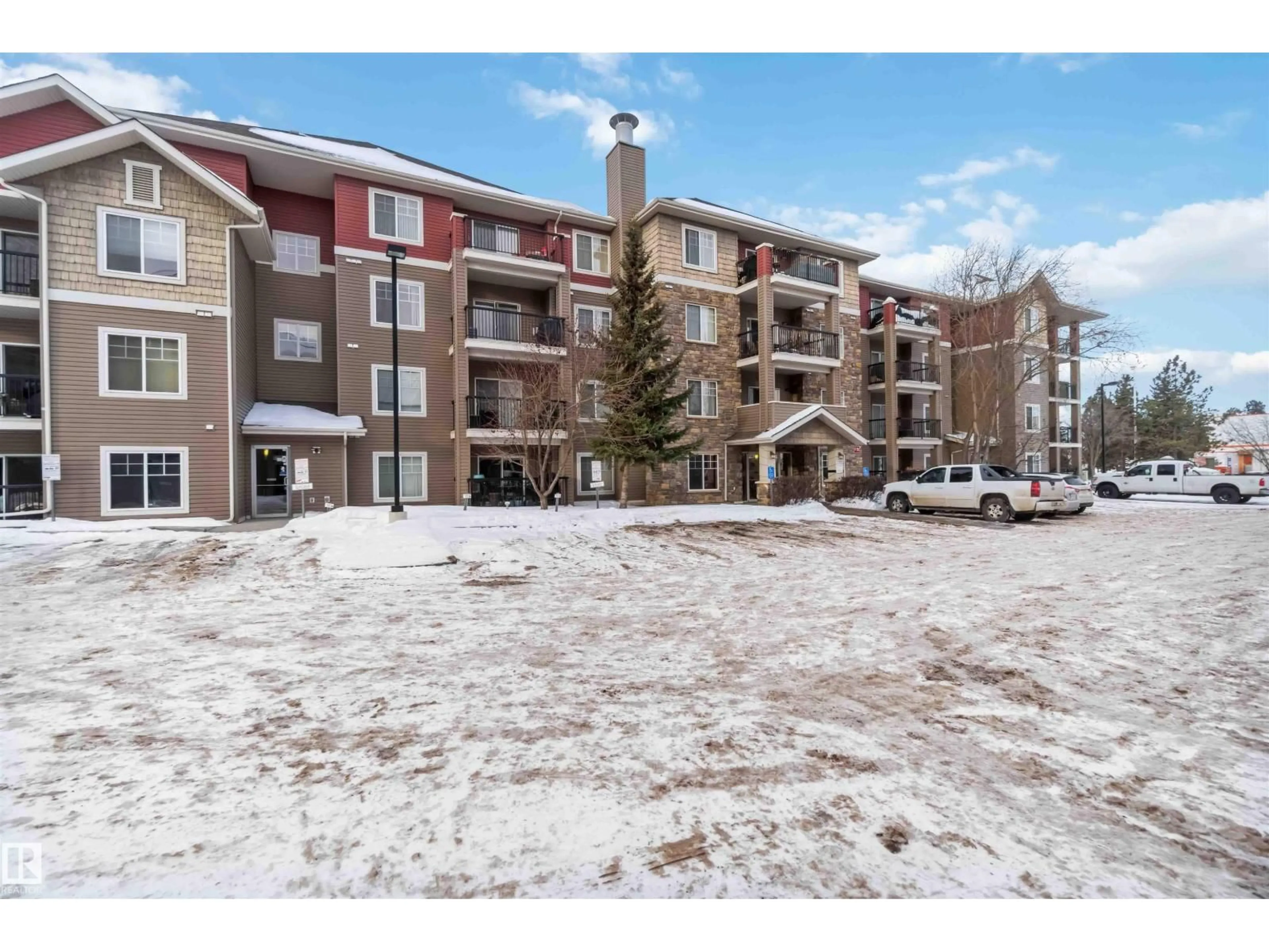 A pic from outside/outdoor area/front of a property/back of a property/a pic from drone, unknown for 319 17415 99 AV, Edmonton Alberta T5T0W8