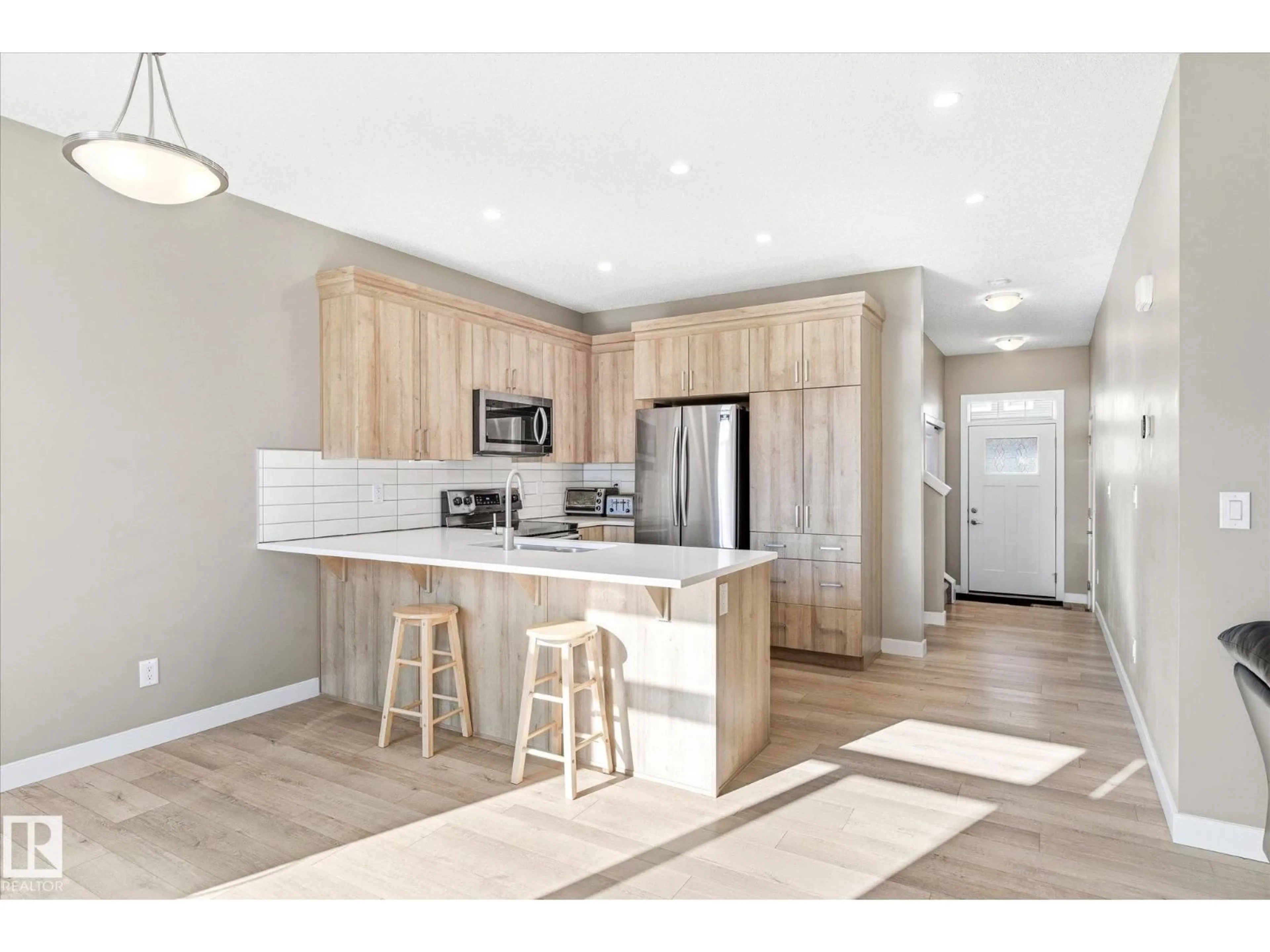 Open concept kitchen, unknown for NW - 1615 203 ST, Edmonton Alberta T6M1K8