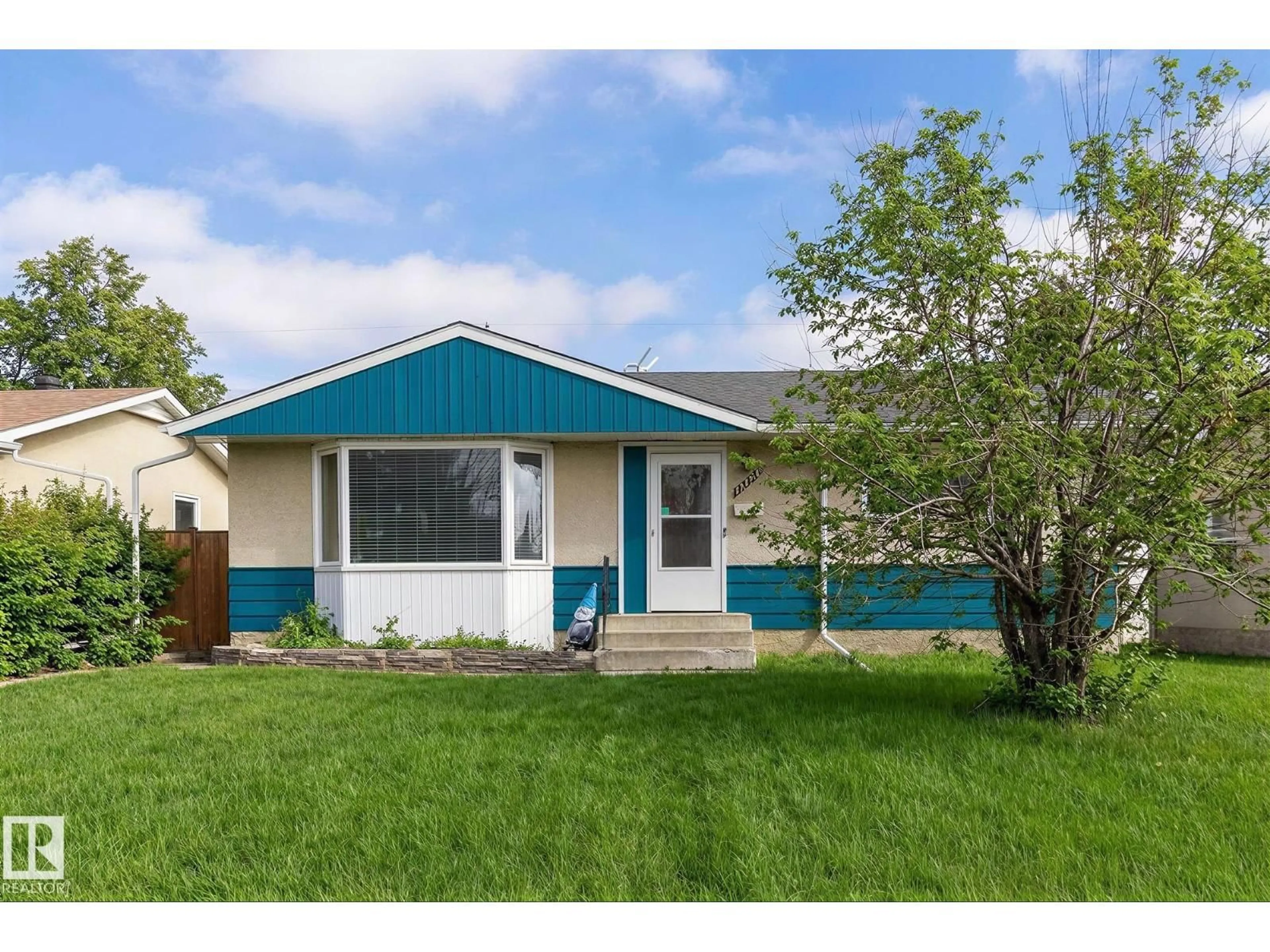 Home with vinyl exterior material, street for A - 16724 79 AV, Edmonton Alberta T5R3J5