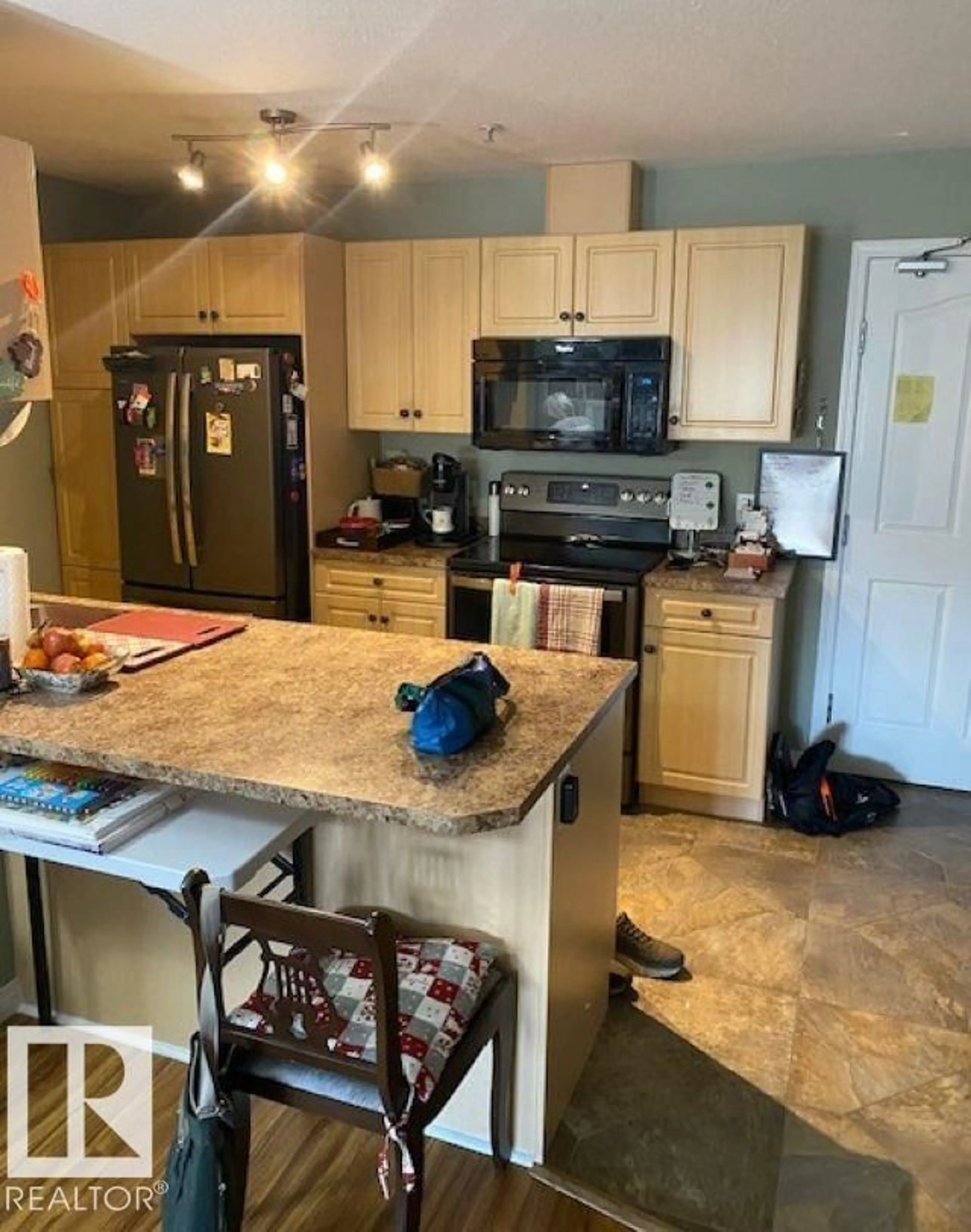 Open concept kitchen, ceramic/tile floor for 404 73 A MCKENNEY AV, St. Albert Alberta T8N7E6