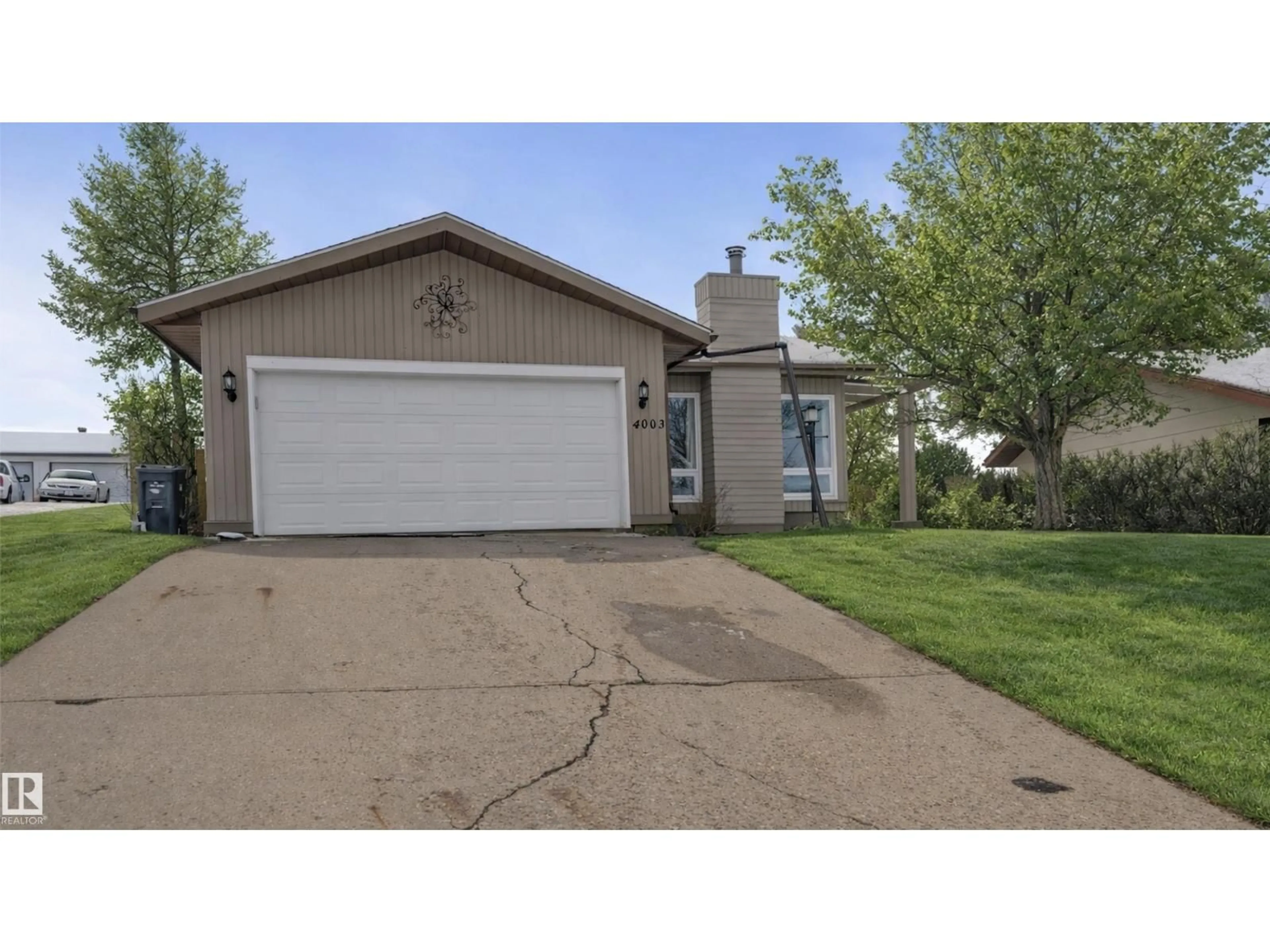 Home with vinyl exterior material, street for 4003 50A AV, Cold Lake Alberta T9M2A6