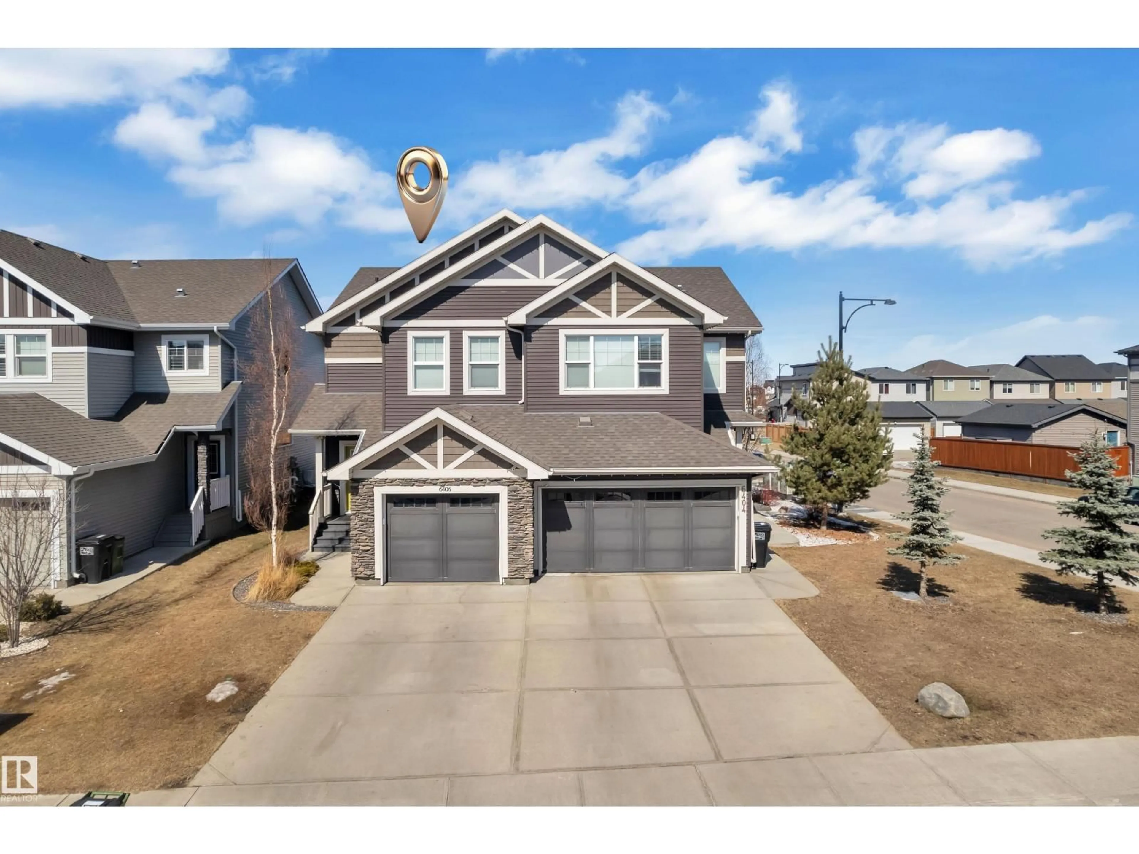 A pic from outside/outdoor area/front of a property/back of a property/a pic from drone, street for 6406 169 AV, Edmonton Alberta T5Y3W6
