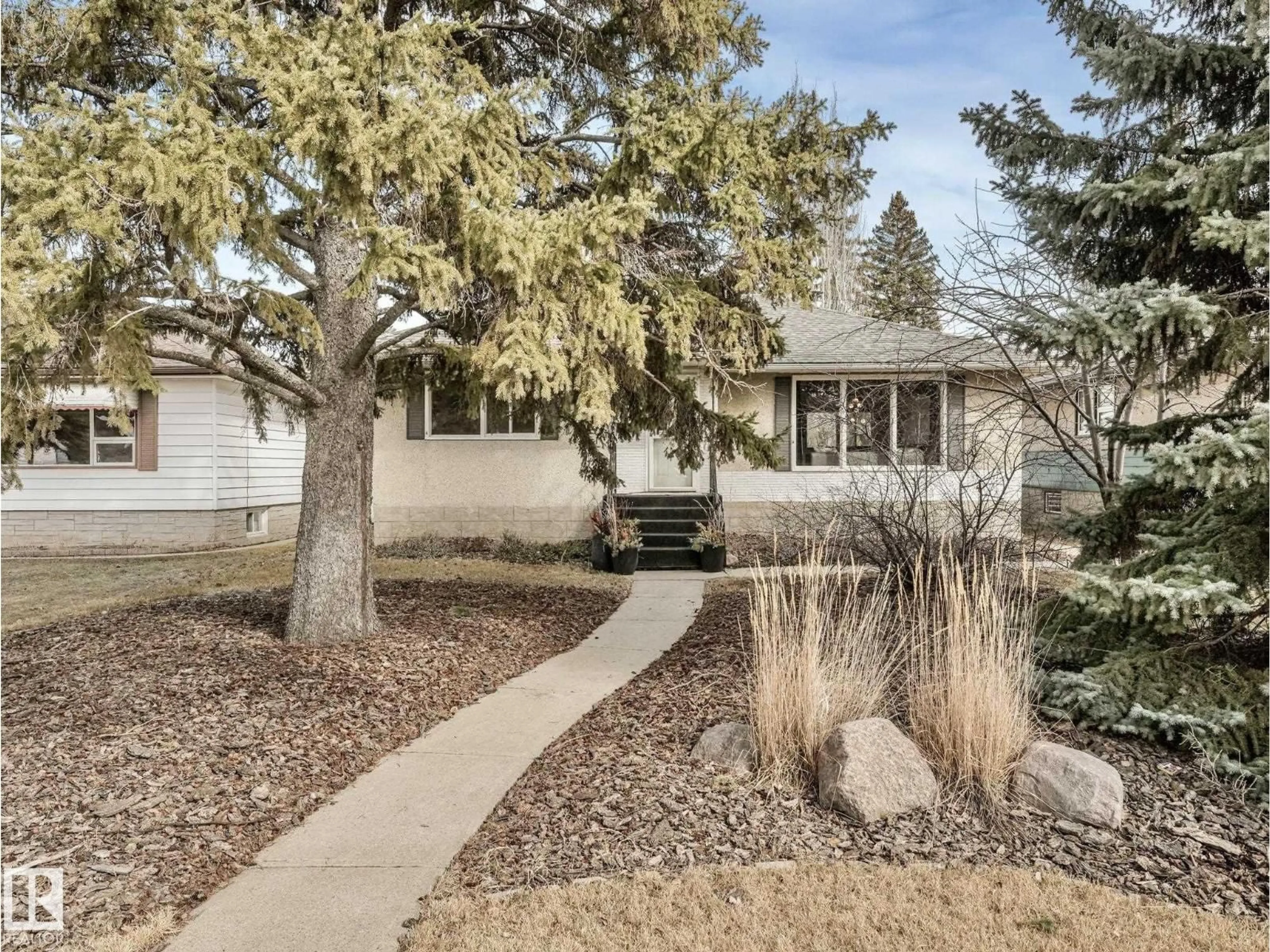 Home with vinyl exterior material, street for 9419 145 ST, Edmonton Alberta T5R0V3