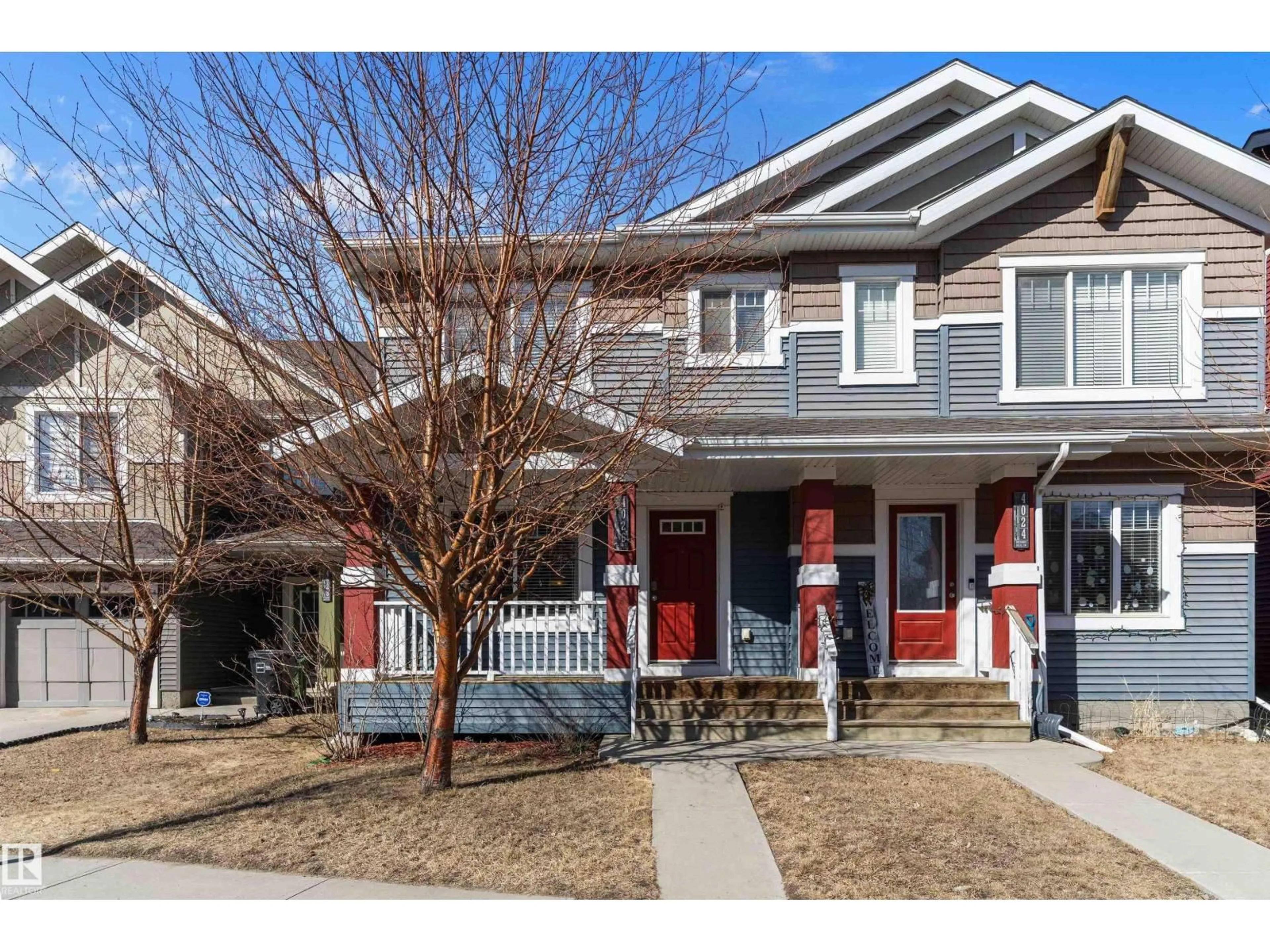 Home with vinyl exterior material, street for 4026 ORCHARDS DR, Edmonton Alberta T6X2B3