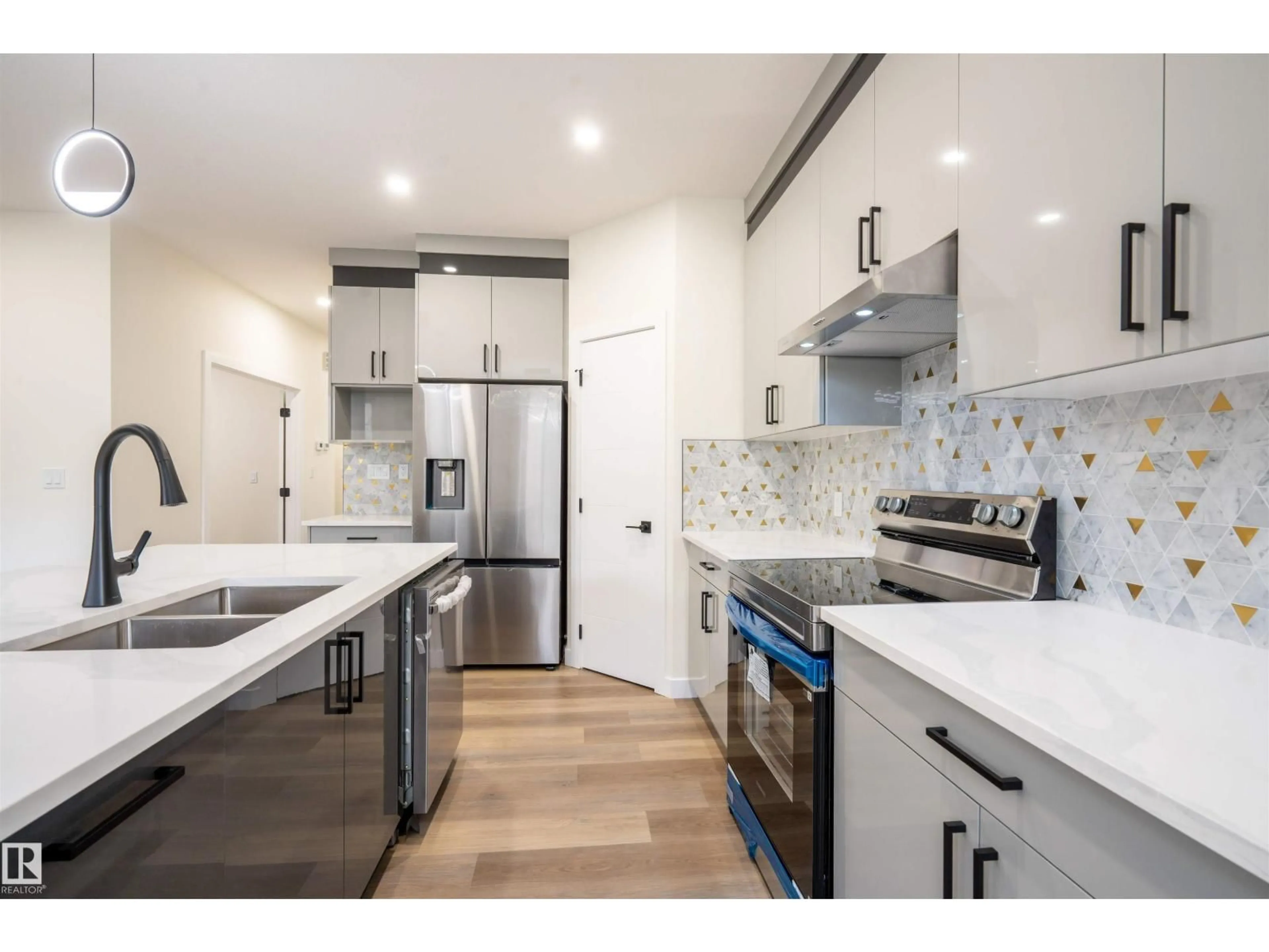 Open concept kitchen, unknown for 5720 176 AV, Edmonton Alberta T5Y0K8