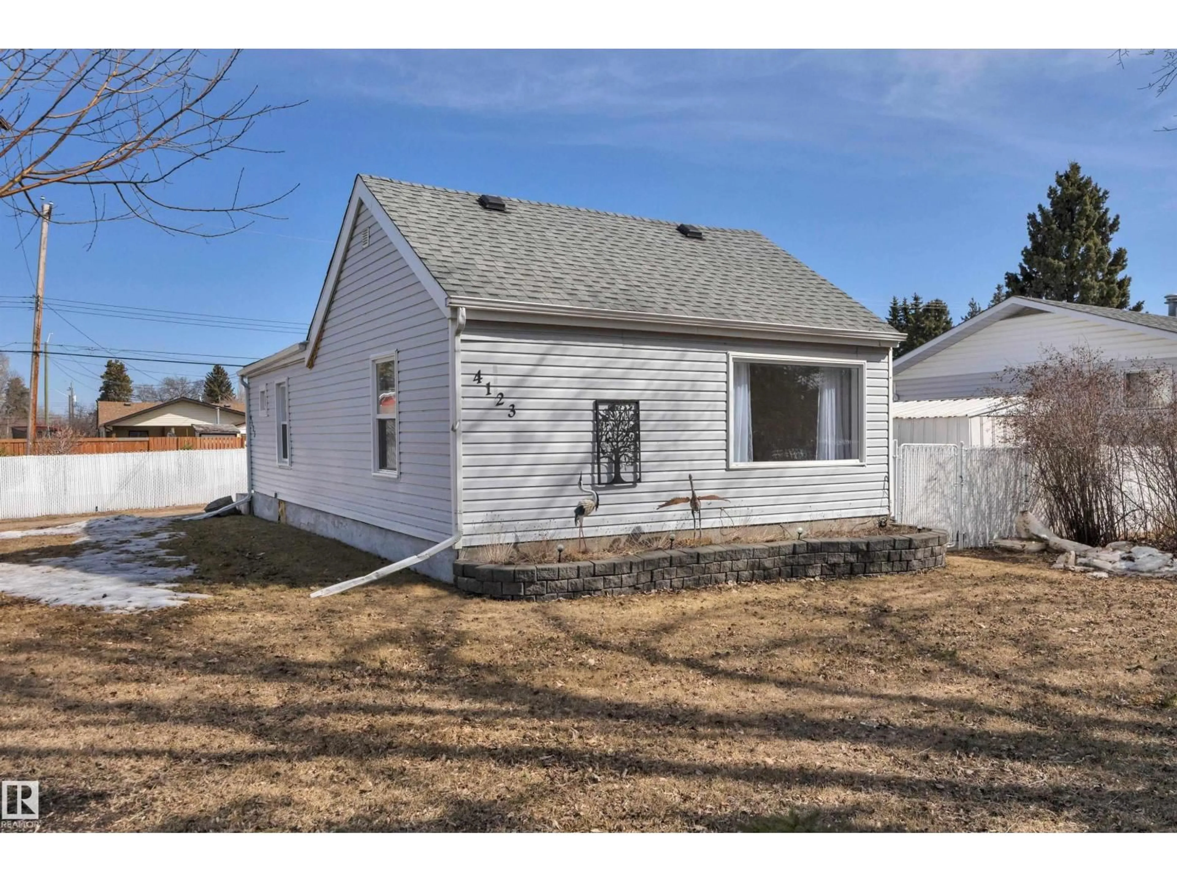 Home with vinyl exterior material, street for 4123 53A ST, Wetaskiwin Alberta T9A1S2