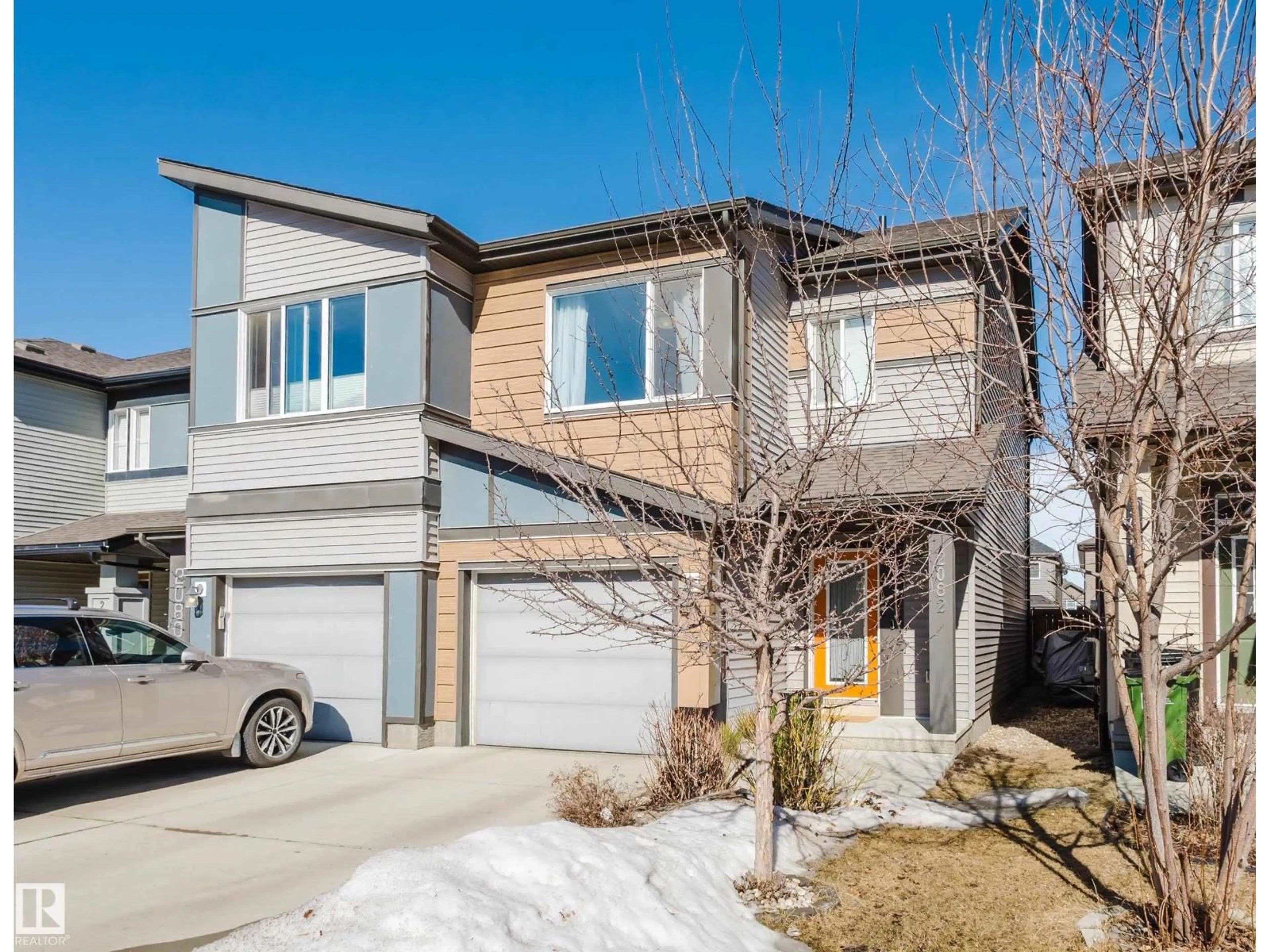 Home with vinyl exterior material, street for 2082 PRICE LANDING SW, Edmonton Alberta T6W3W1