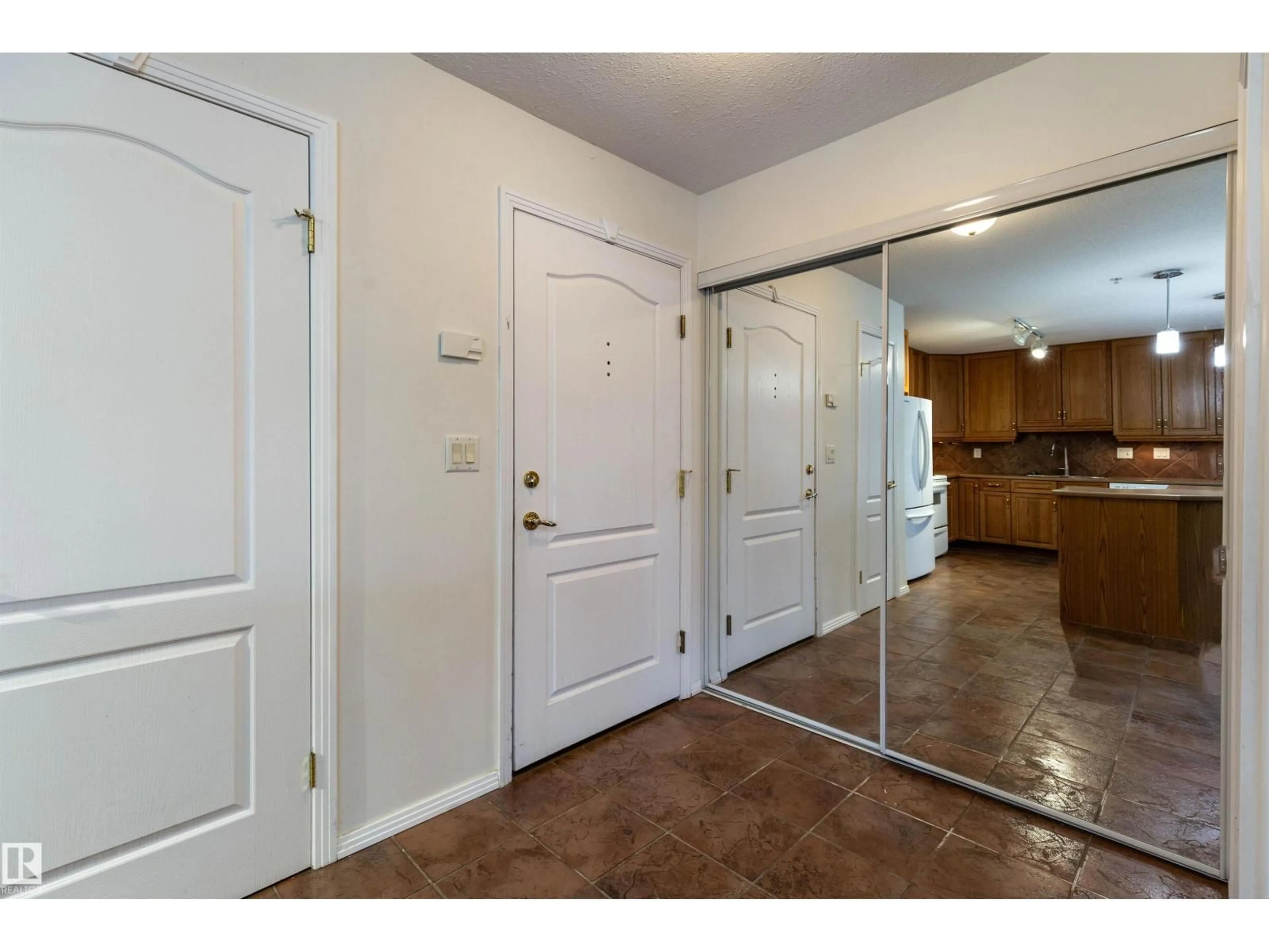 Indoor entryway for #105 - 8912 156 ST, Edmonton Alberta T5R5Z2