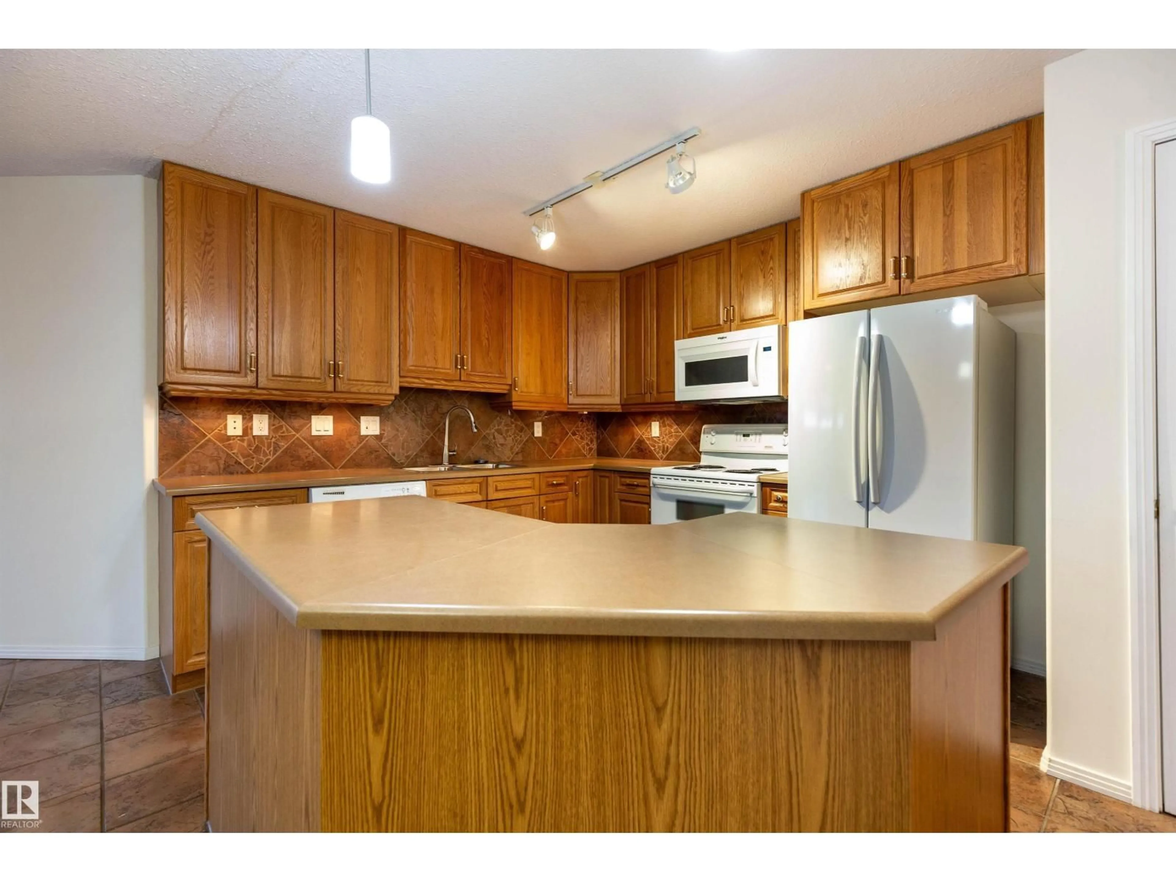Standard kitchen, unknown for #105 - 8912 156 ST, Edmonton Alberta T5R5Z2