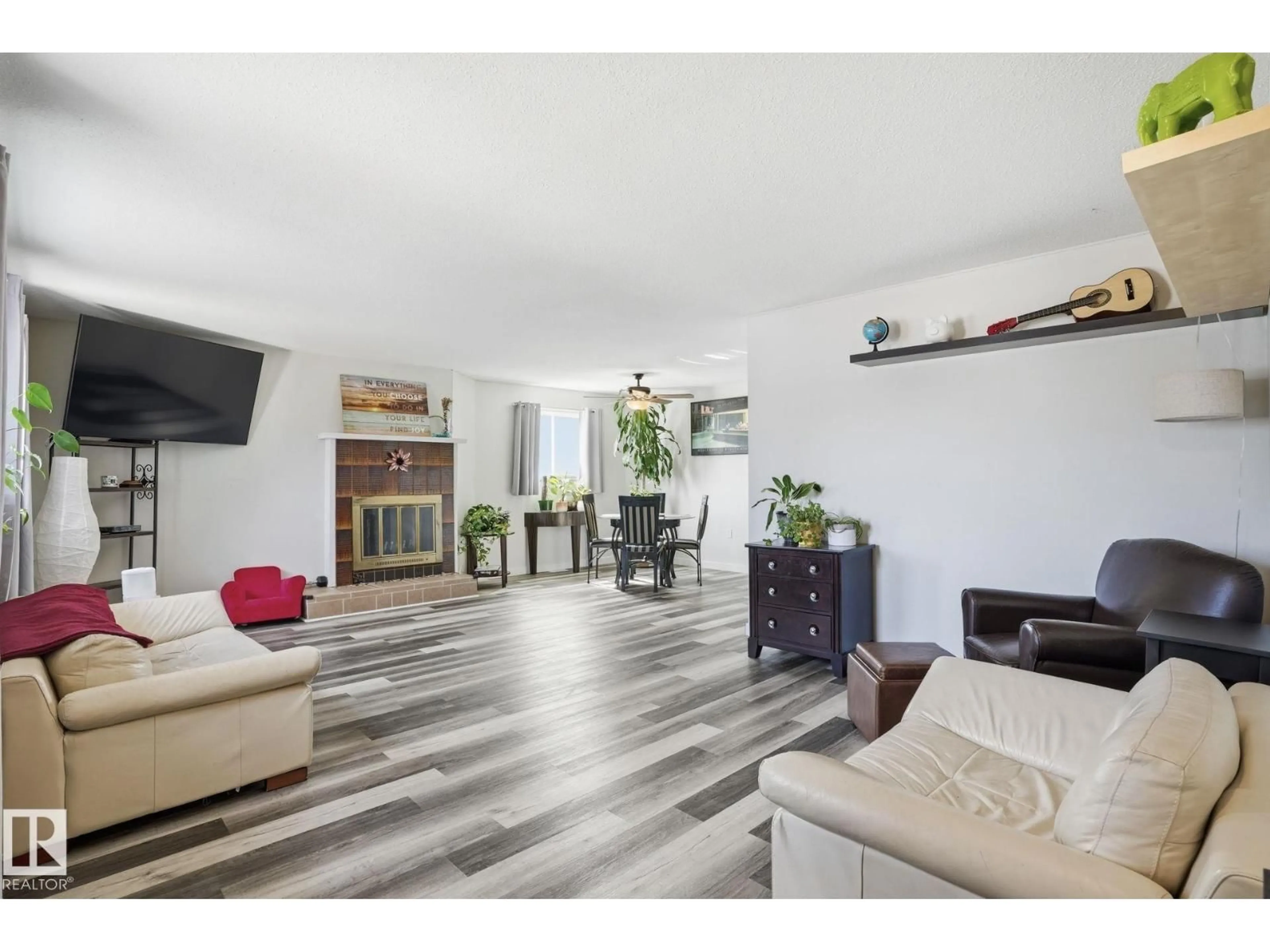 Living room with furniture, wood/laminate floor for 12340 ST ALBERT TR, Edmonton Alberta T5L4G8