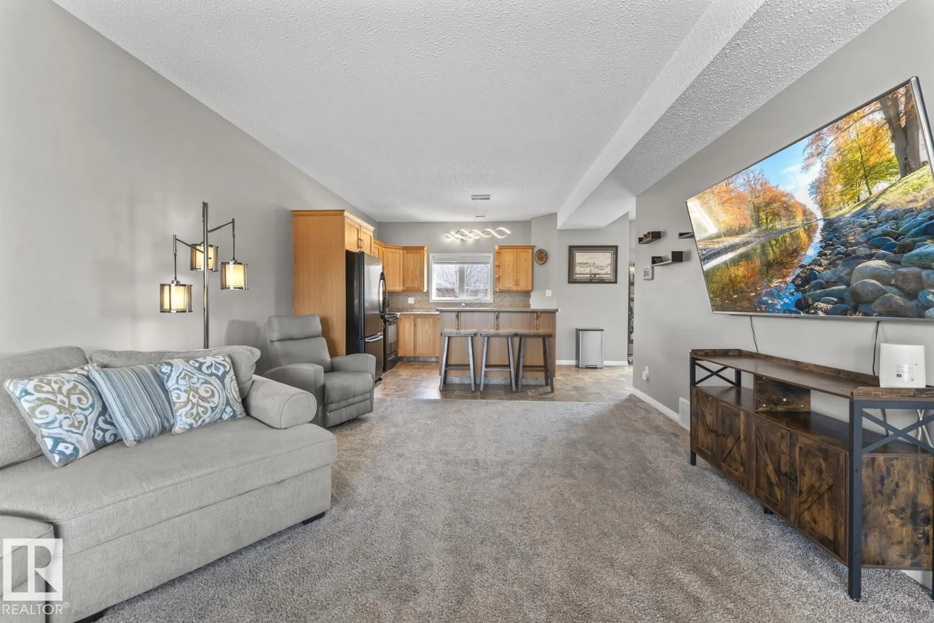 Living room with furniture, unknown for 706 ROBIN CL, Cold Lake Alberta T9M2B7