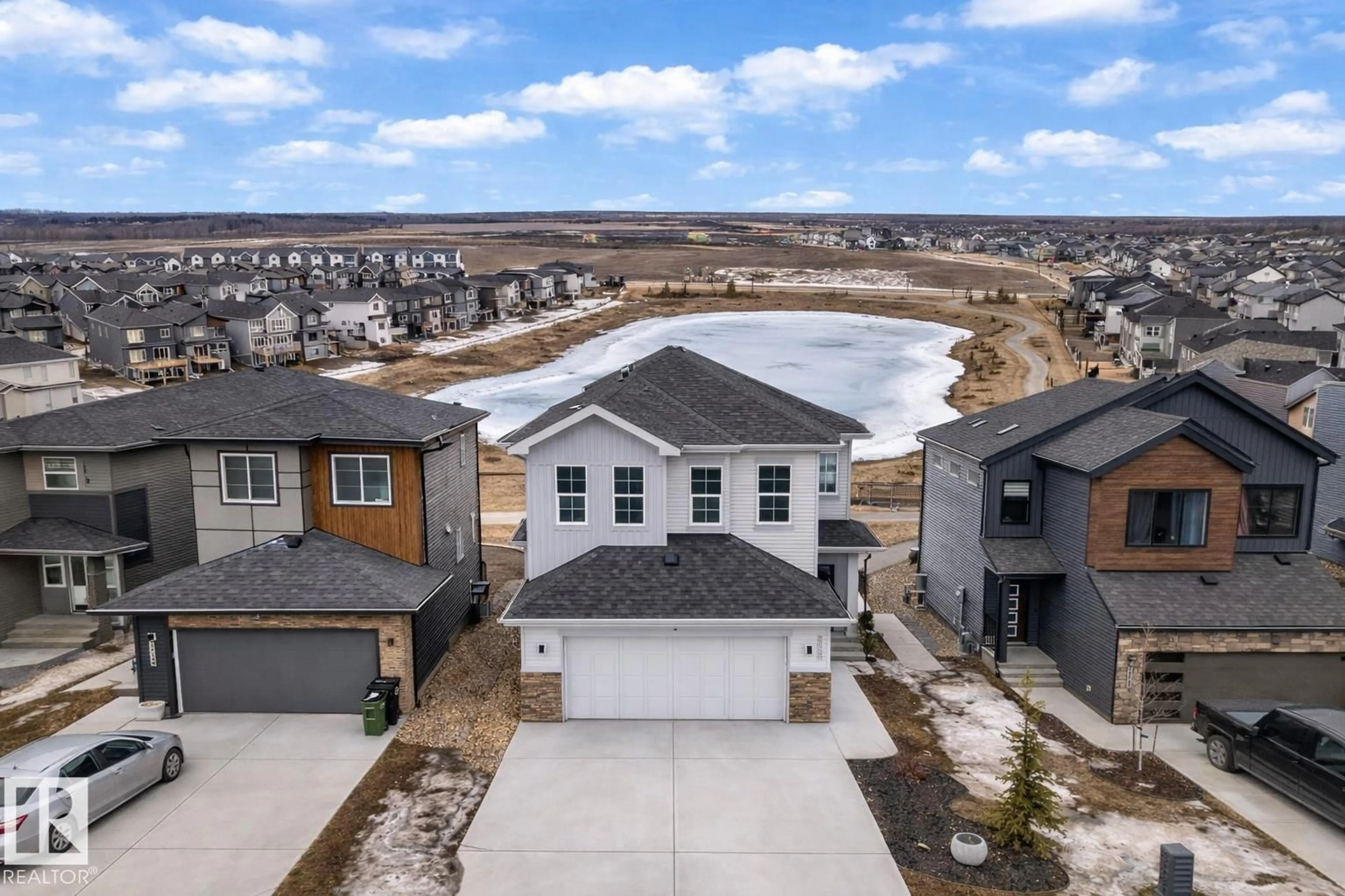 A pic from outside/outdoor area/front of a property/back of a property/a pic from drone, street for 2128 190 ST, Edmonton Alberta T6M1R4