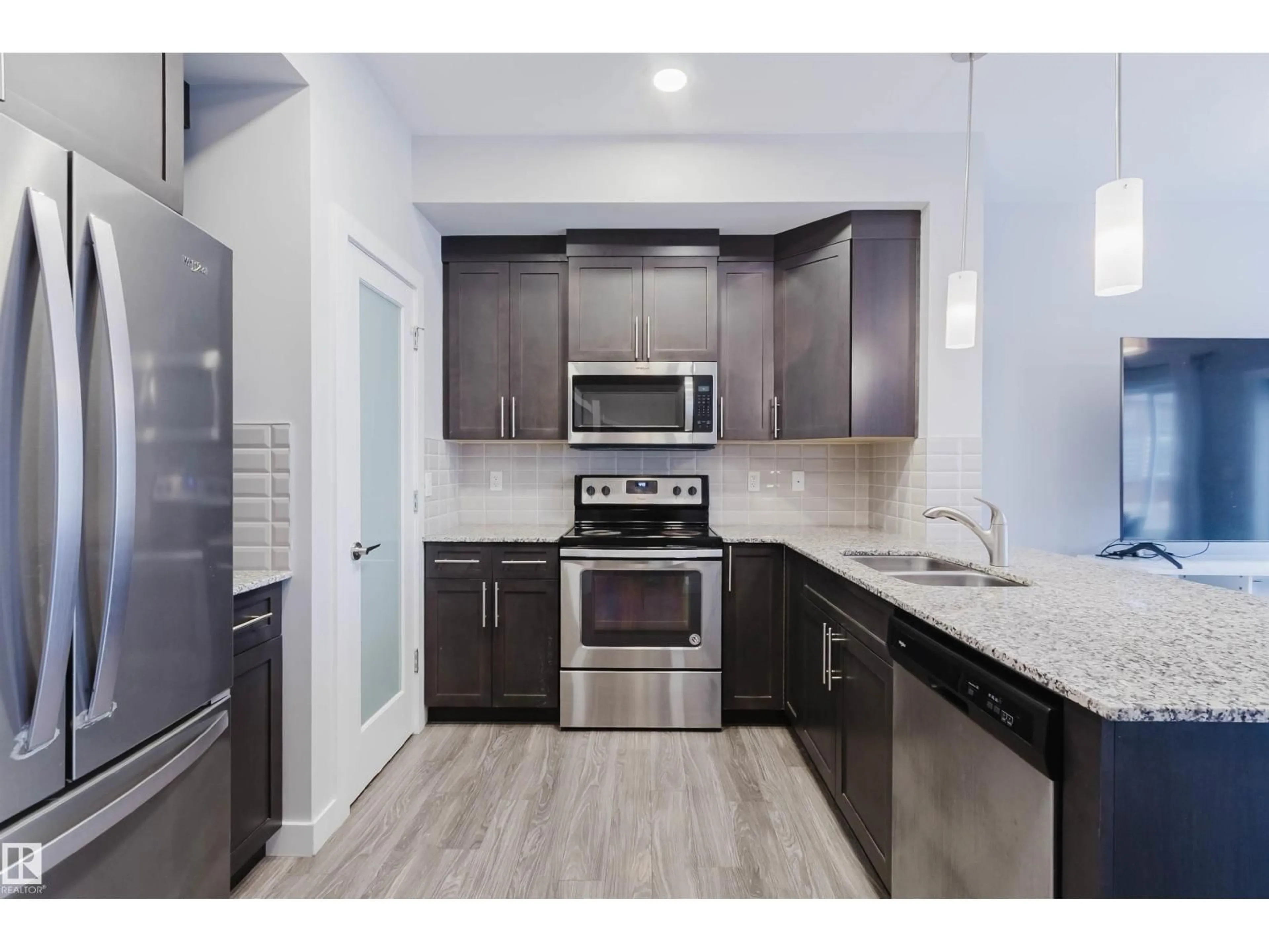 Open concept kitchen, ceramic/tile floor for SW - 1793 KEENE CR, Edmonton Alberta T6W3W3