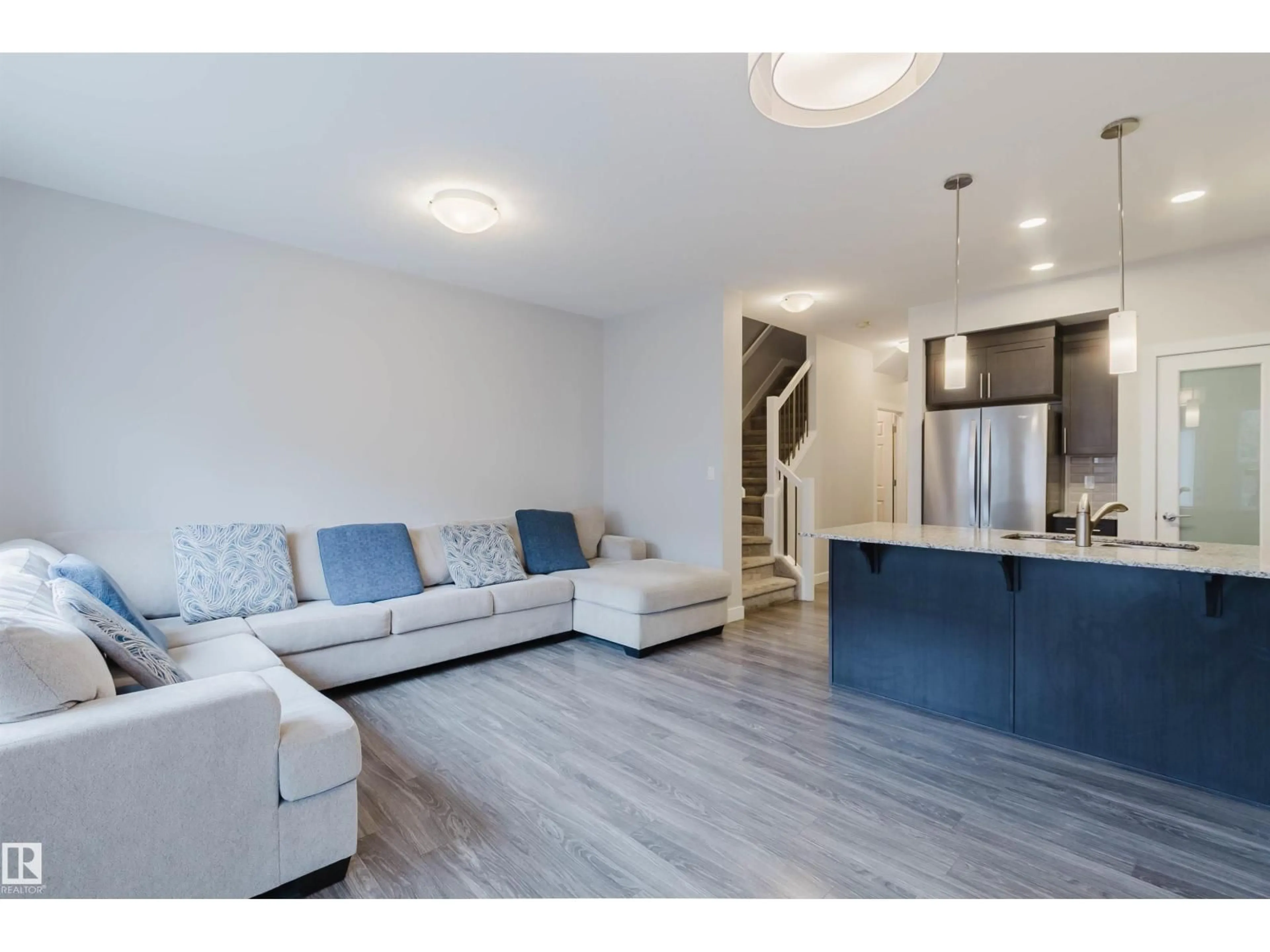 Open concept kitchen, wood/laminate floor for SW - 1793 KEENE CR, Edmonton Alberta T6W3W3