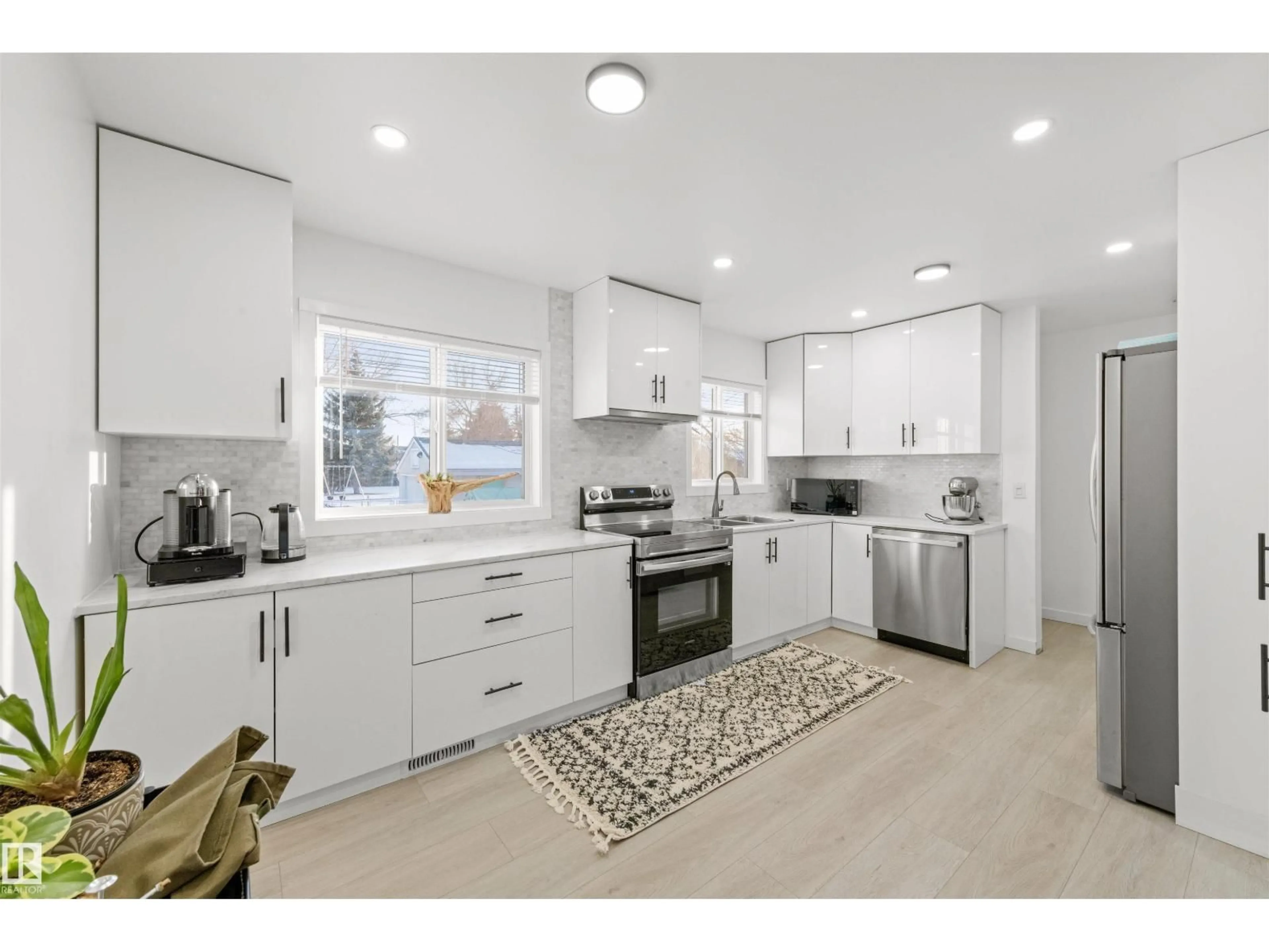 Open concept kitchen, ceramic/tile floor for 3429 120 AV, Edmonton Alberta T5W1K1