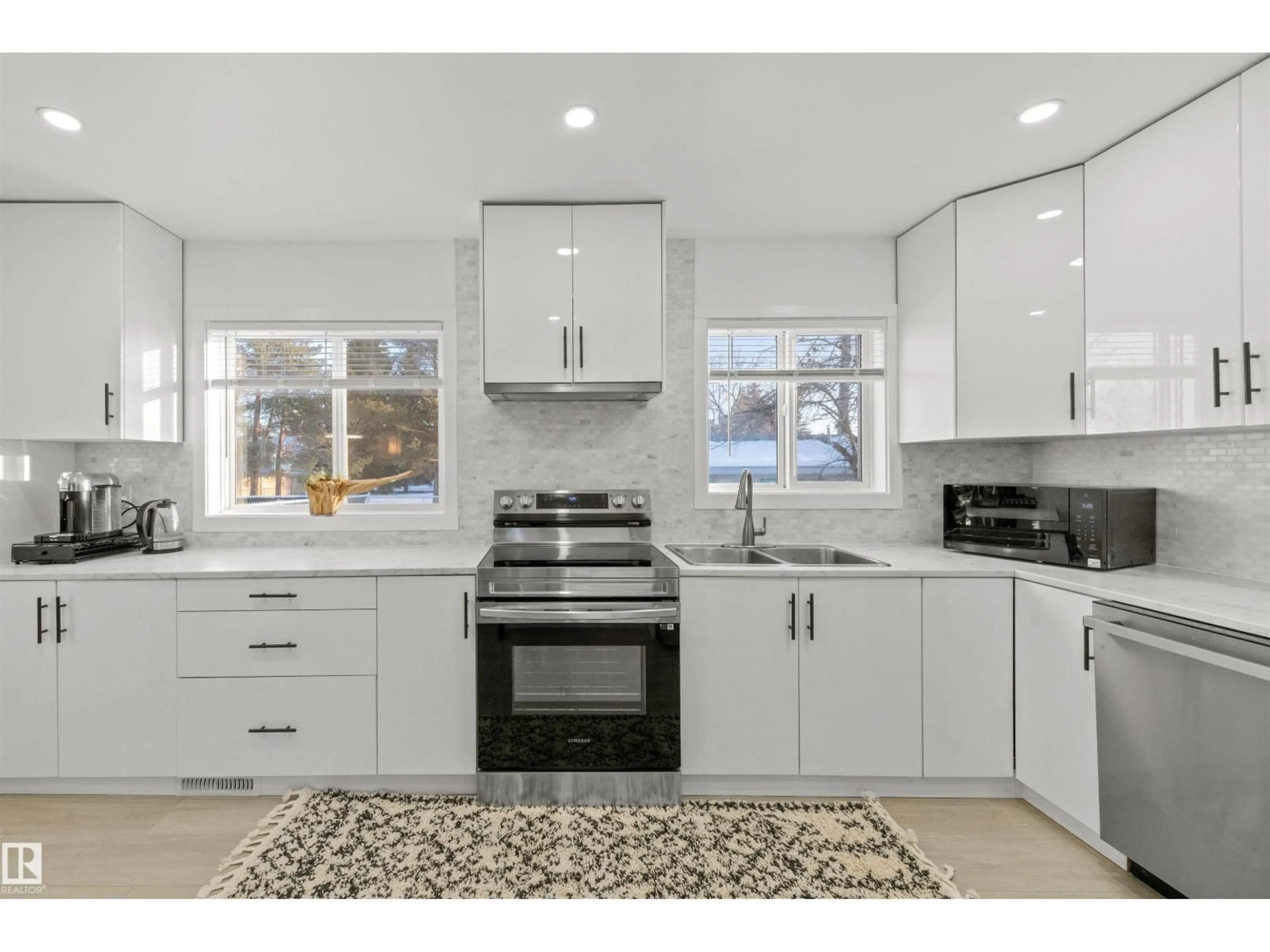 Open concept kitchen, ceramic/tile floor for 3429 120 AV, Edmonton Alberta T5W1K1