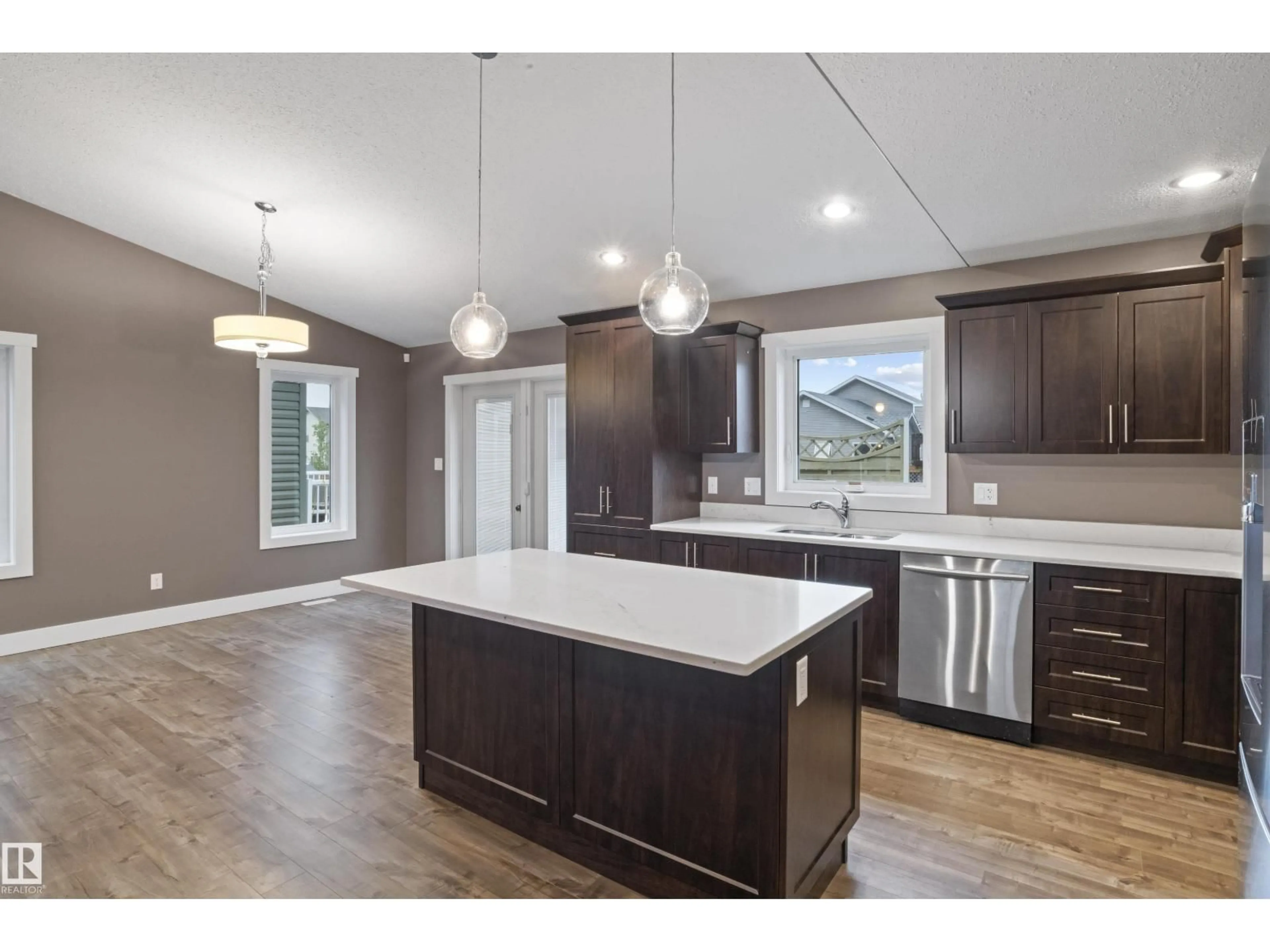 Open concept kitchen, wood/laminate floor for 255 TERRA NOVA CR, Cold Lake Alberta T9M1L3