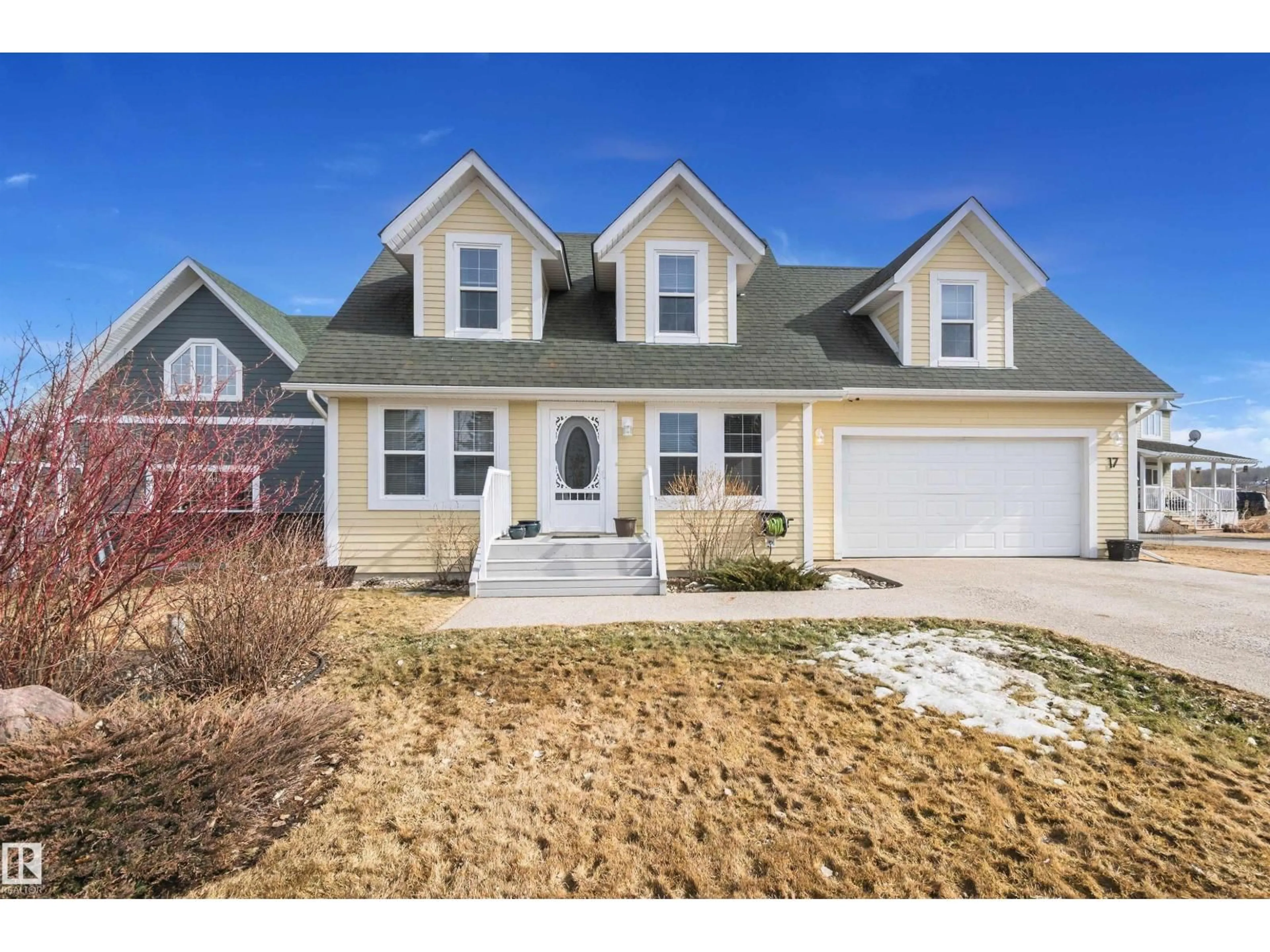 Home with vinyl exterior material, street for 17 SUNSET HARBOUR, Rural Wetaskiwin County Alberta T0C2V0