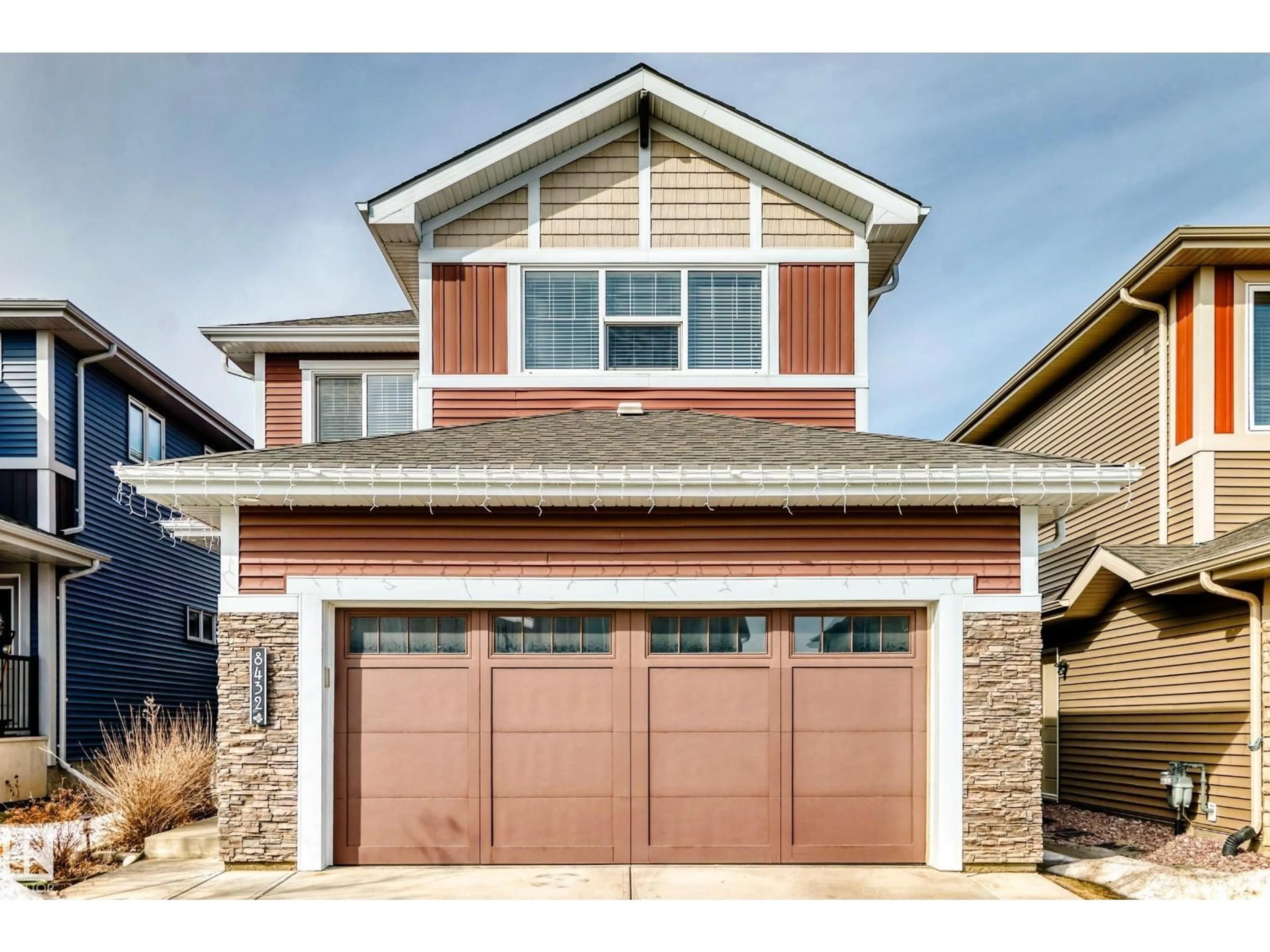 Home with vinyl exterior material, street for 8432 219 ST, Edmonton Alberta T5T7E1