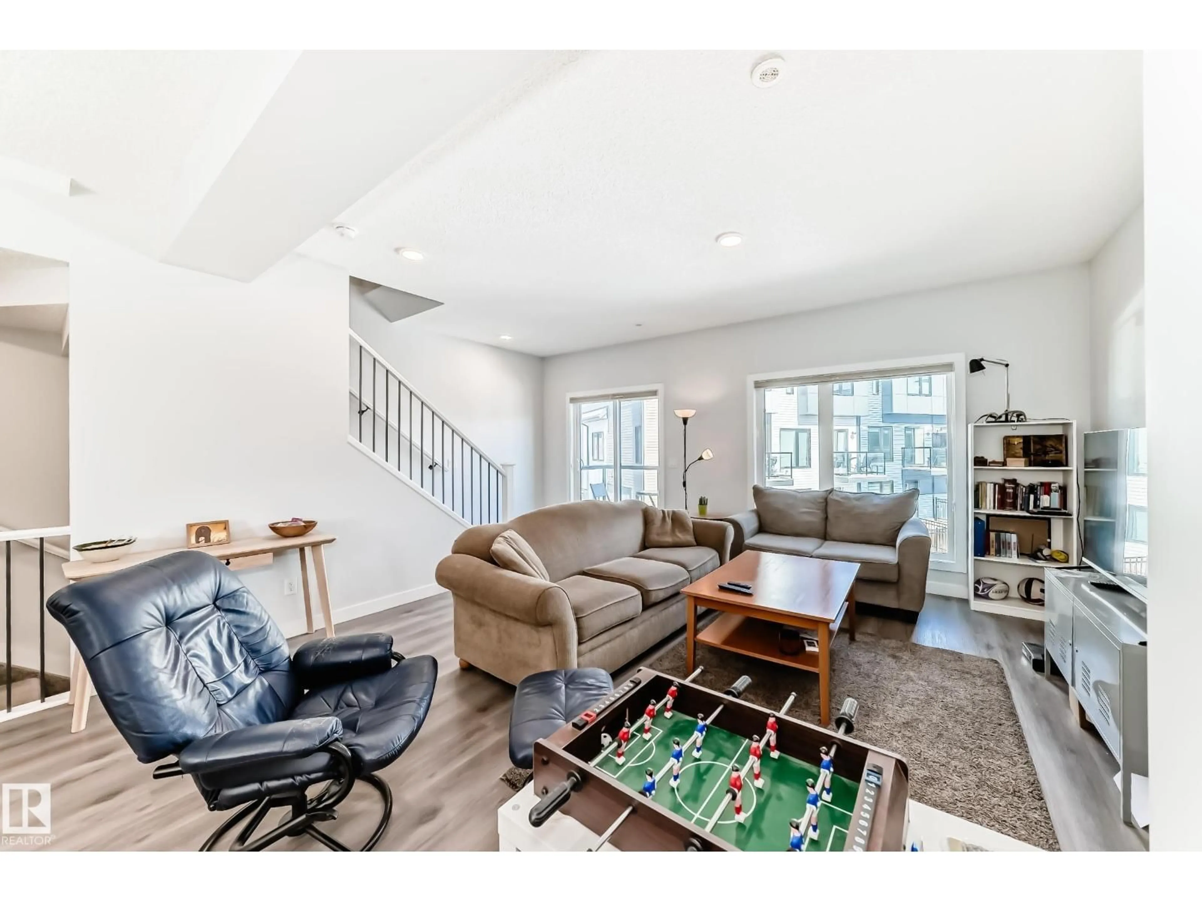 Living room with furniture, unknown for SW - 82 11910 35 AV, Edmonton Alberta T6W4Z8