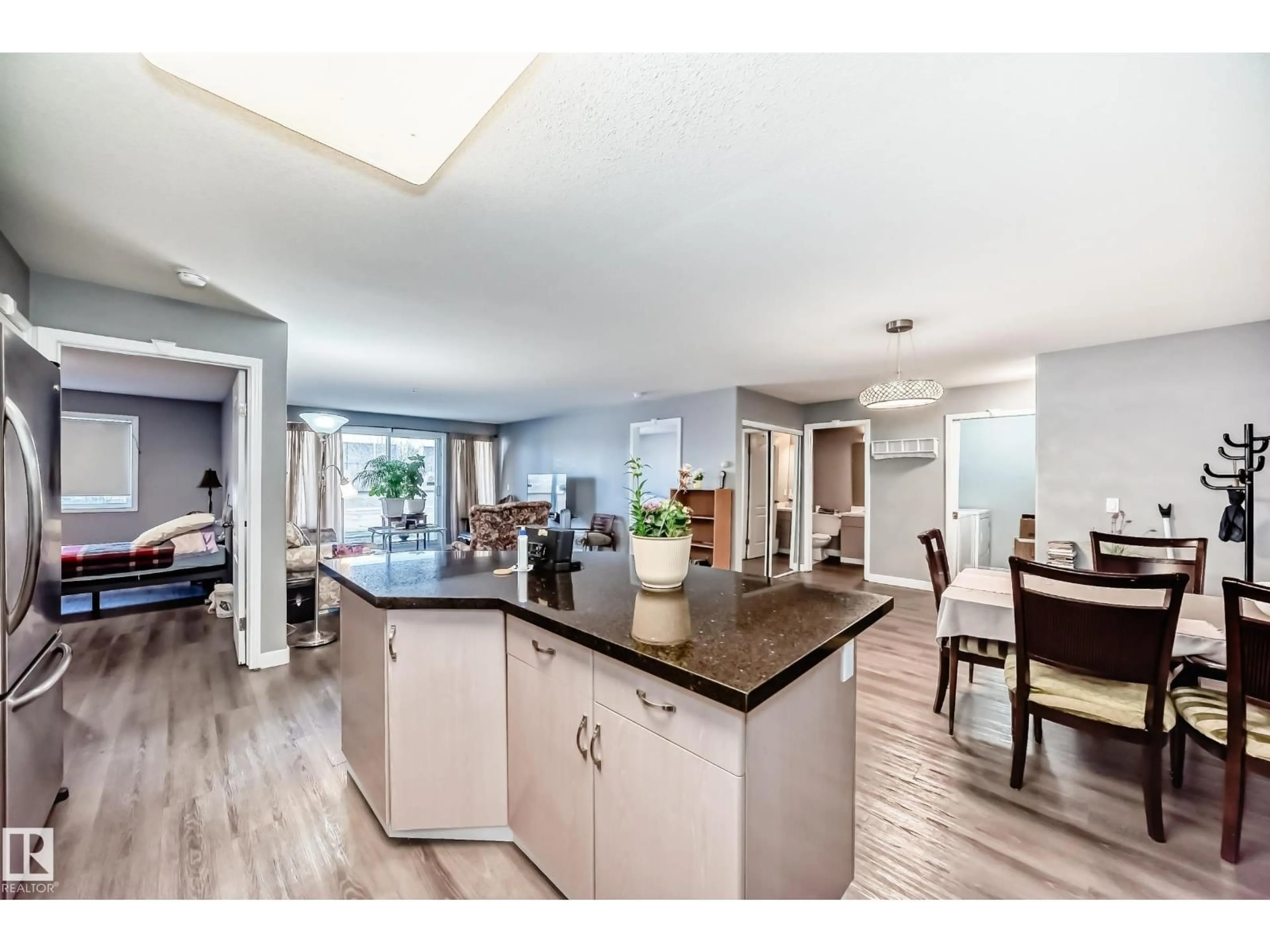 Open concept kitchen, unknown for #119 - 10421 42 AV, Edmonton Alberta T8J7C8