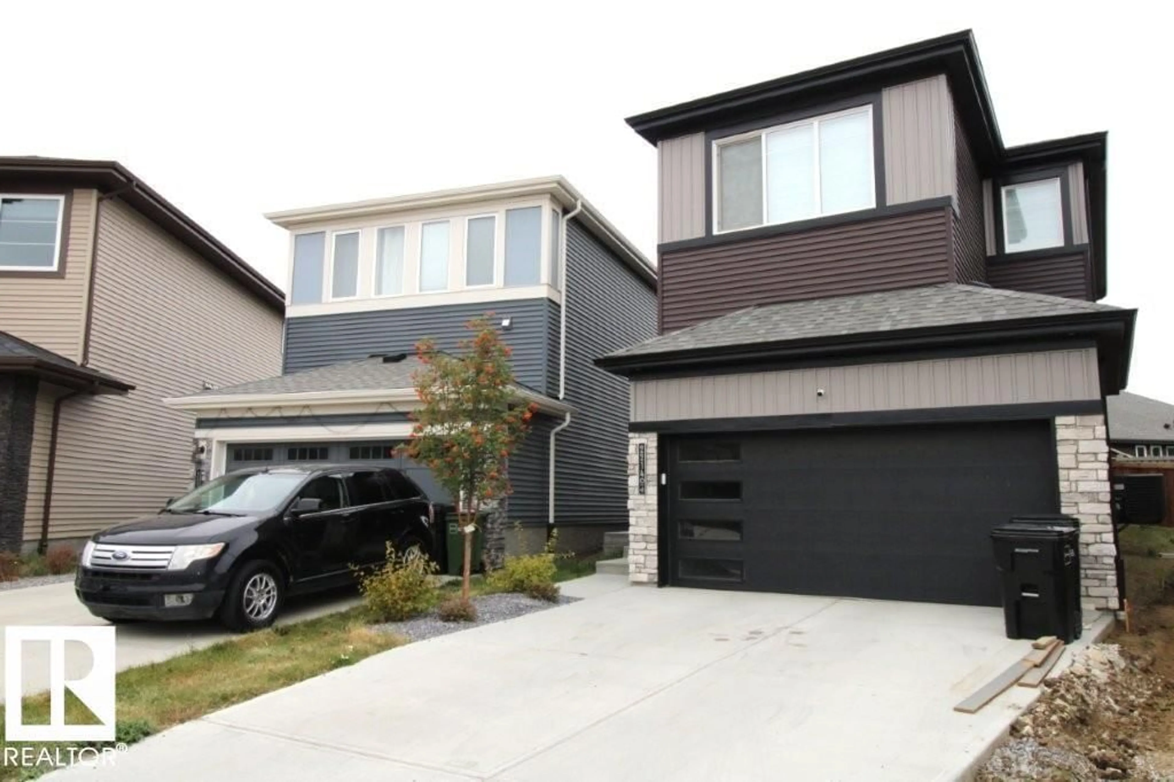 Home with vinyl exterior material, street for 22140 81 AV, Edmonton Alberta T5T7R6