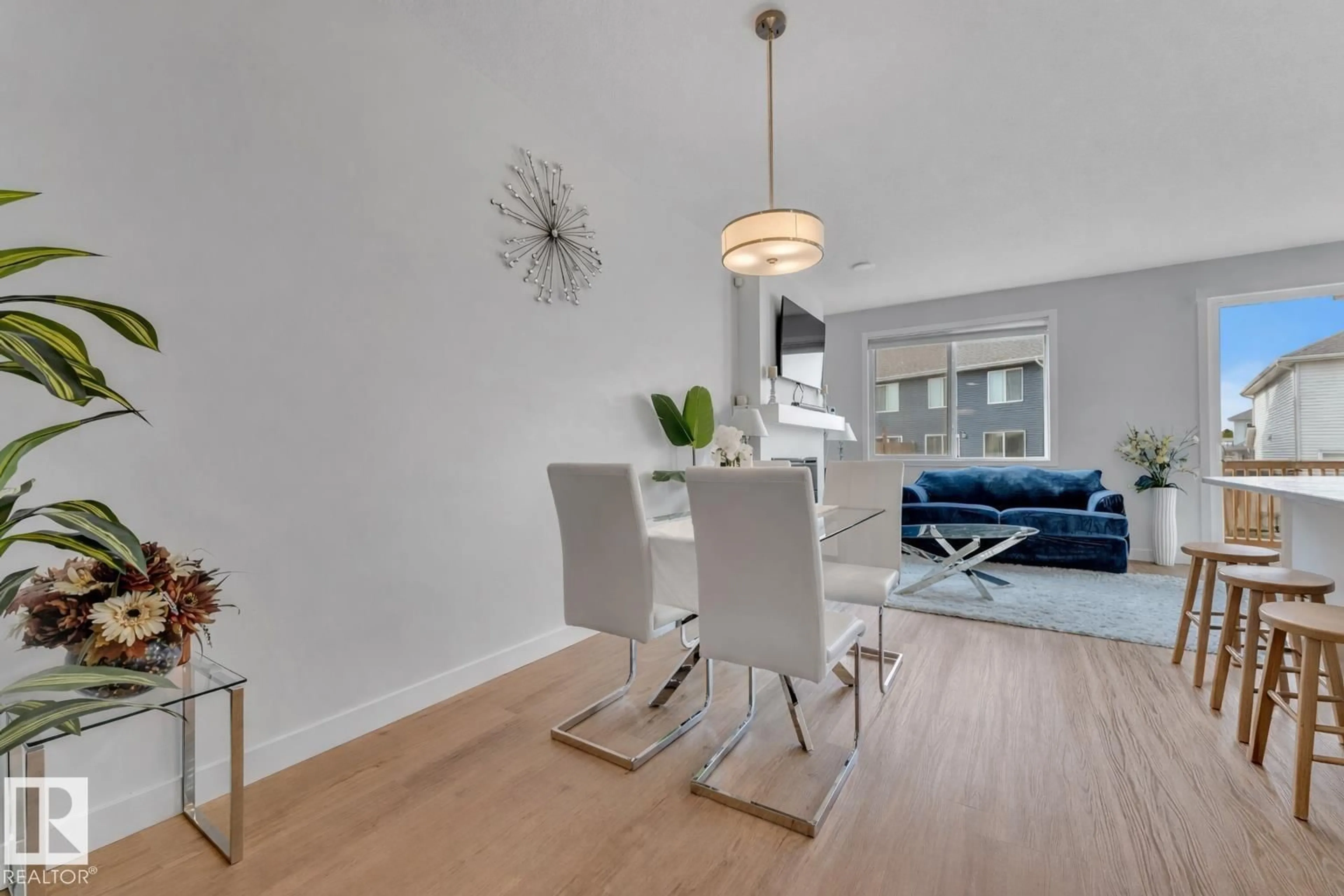 Living room with furniture, wood/laminate floor for 3861 CHRUSTAWKA PL, Edmonton Alberta T6W4M9