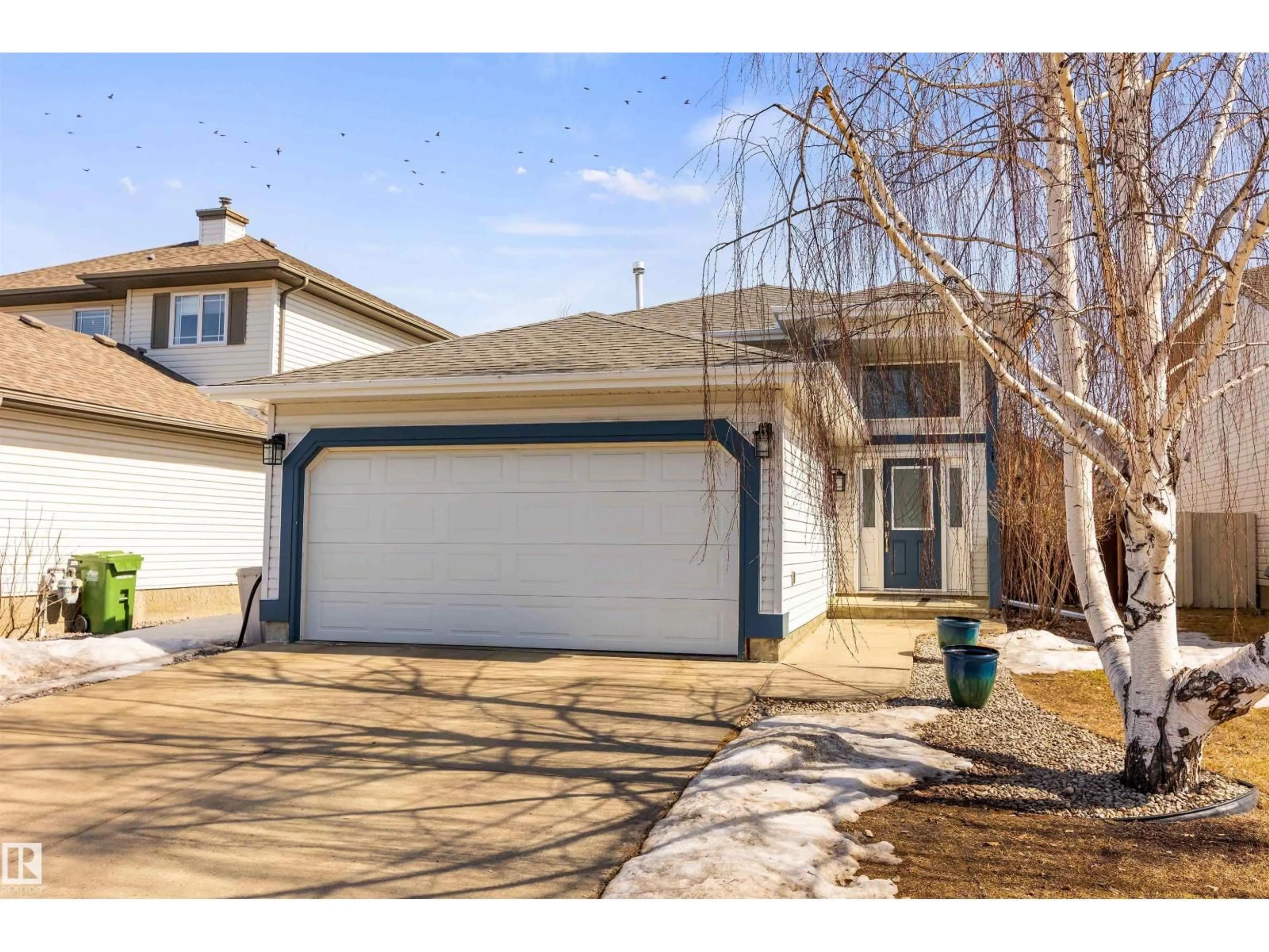 Home with vinyl exterior material, street for 21 DUBONNET WY, St. Albert Alberta T8N6S4