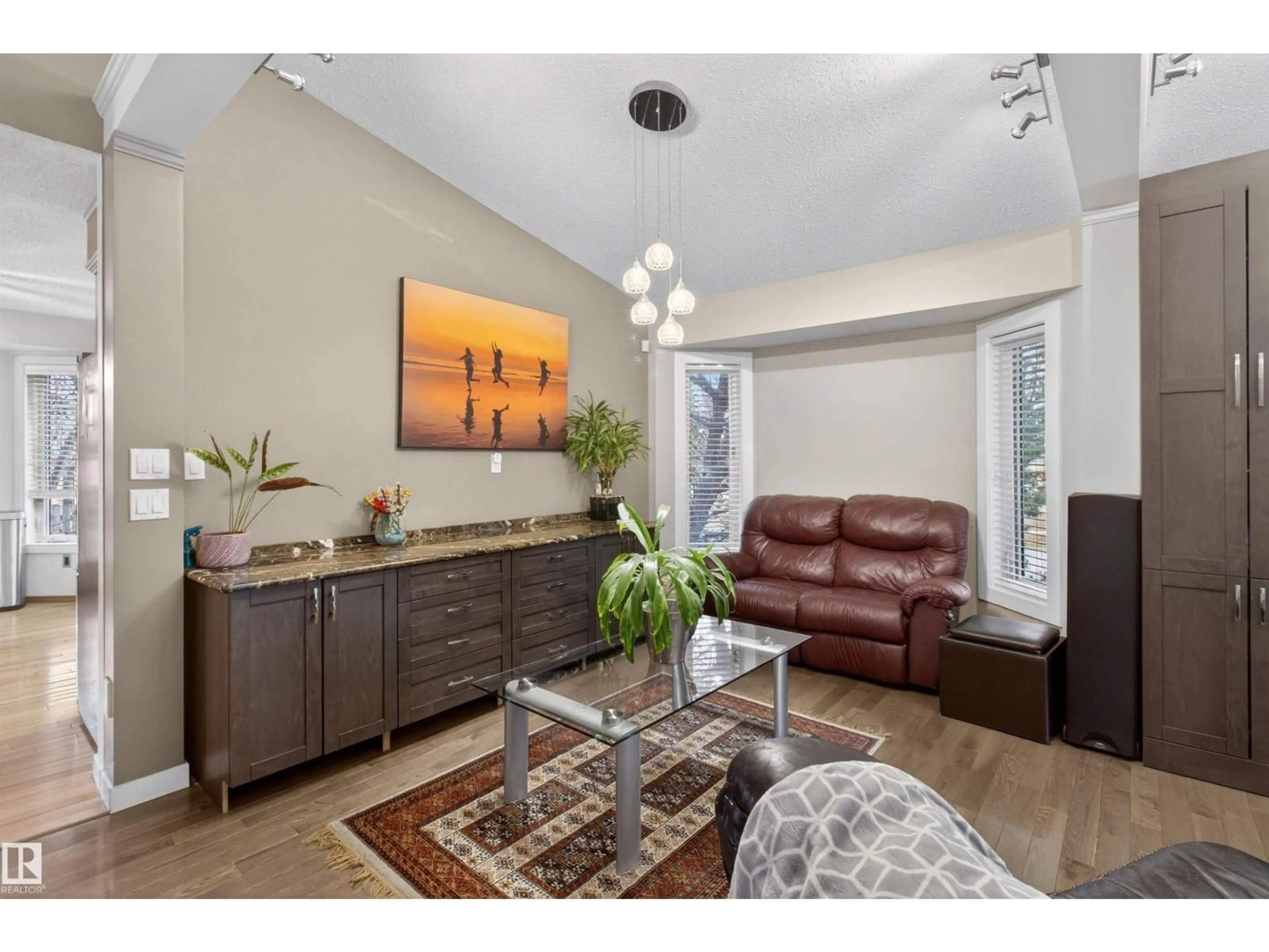 Living room with furniture, wood/laminate floor for 114 CARMEL RD, Sherwood Park Alberta T8A5B3