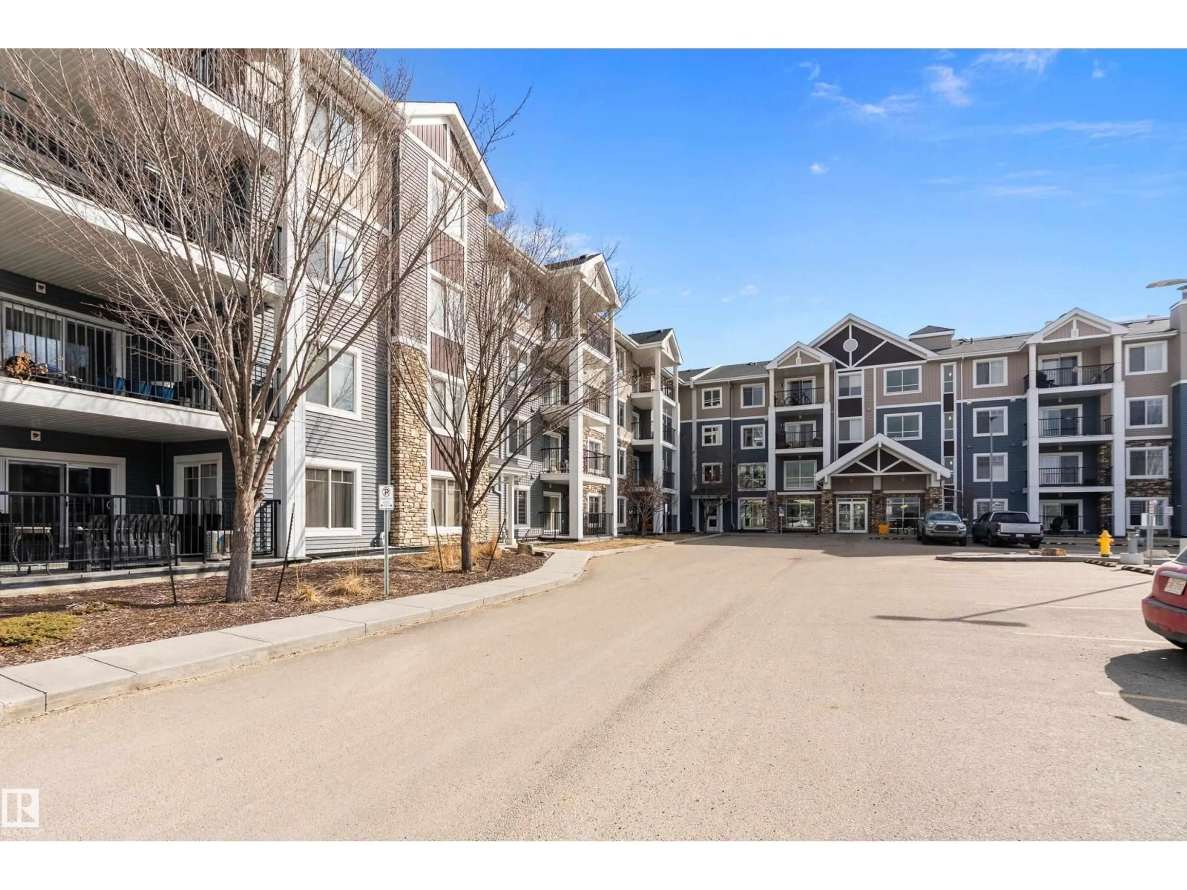 A pic from outside/outdoor area/front of a property/back of a property/a pic from drone, unknown for #309 - 4008 SAVARYN DR, Edmonton Alberta T6X2E5