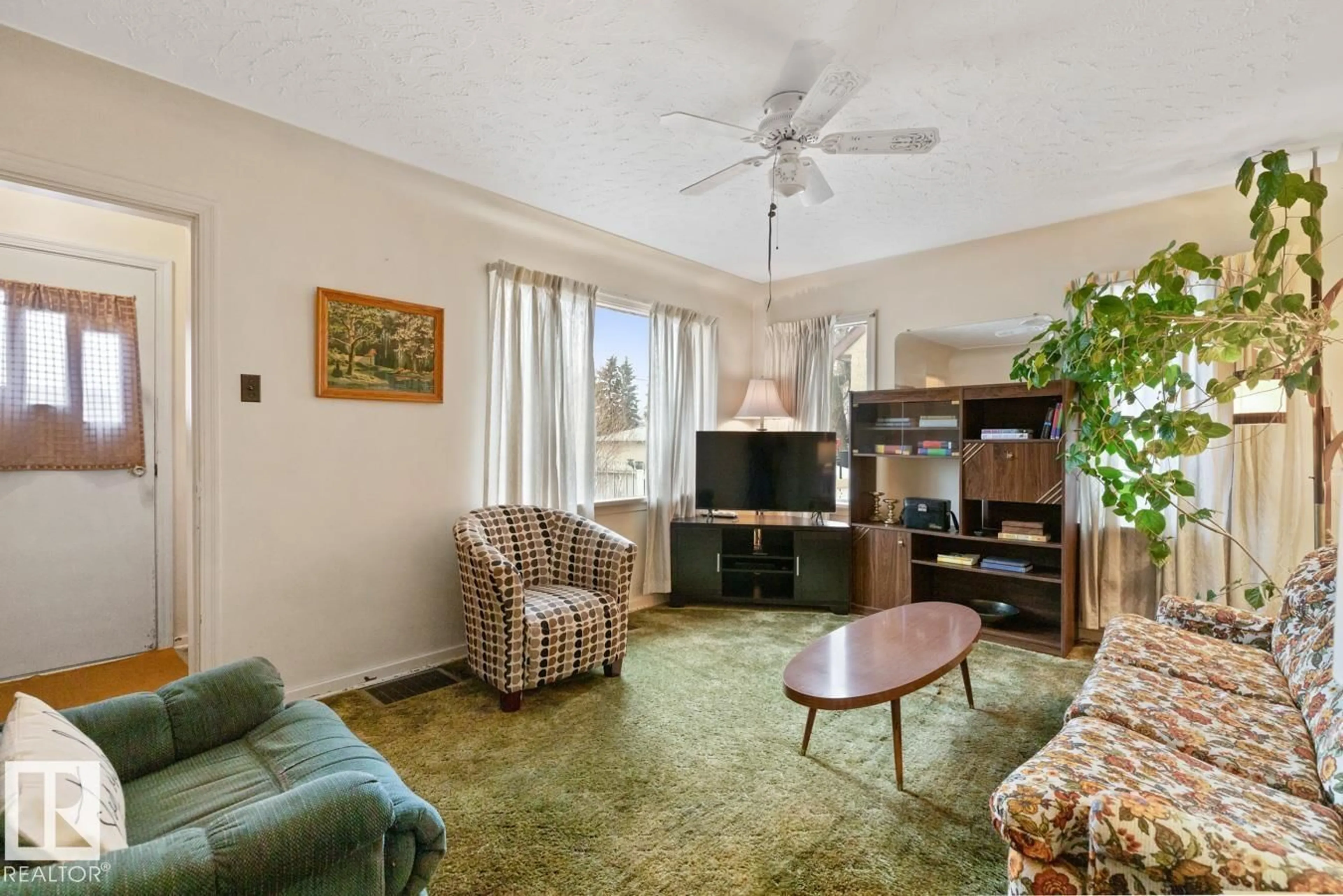 Living room with furniture, unknown for 12044 50 ST, Edmonton Alberta T5W3C4