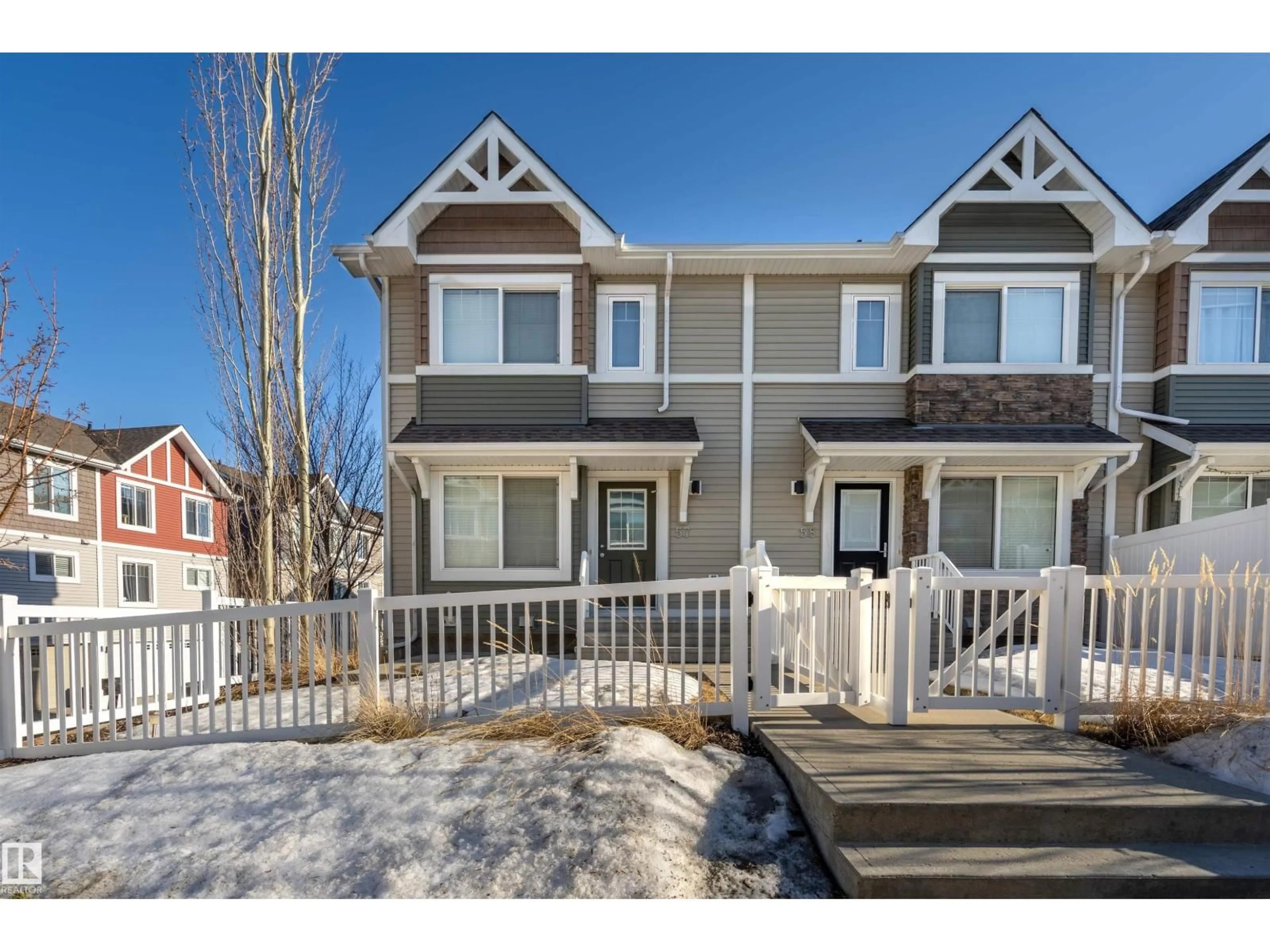 Home with vinyl exterior material, street for #57 - 415 CLAREVIEW RD, Edmonton Alberta T5A0Z6