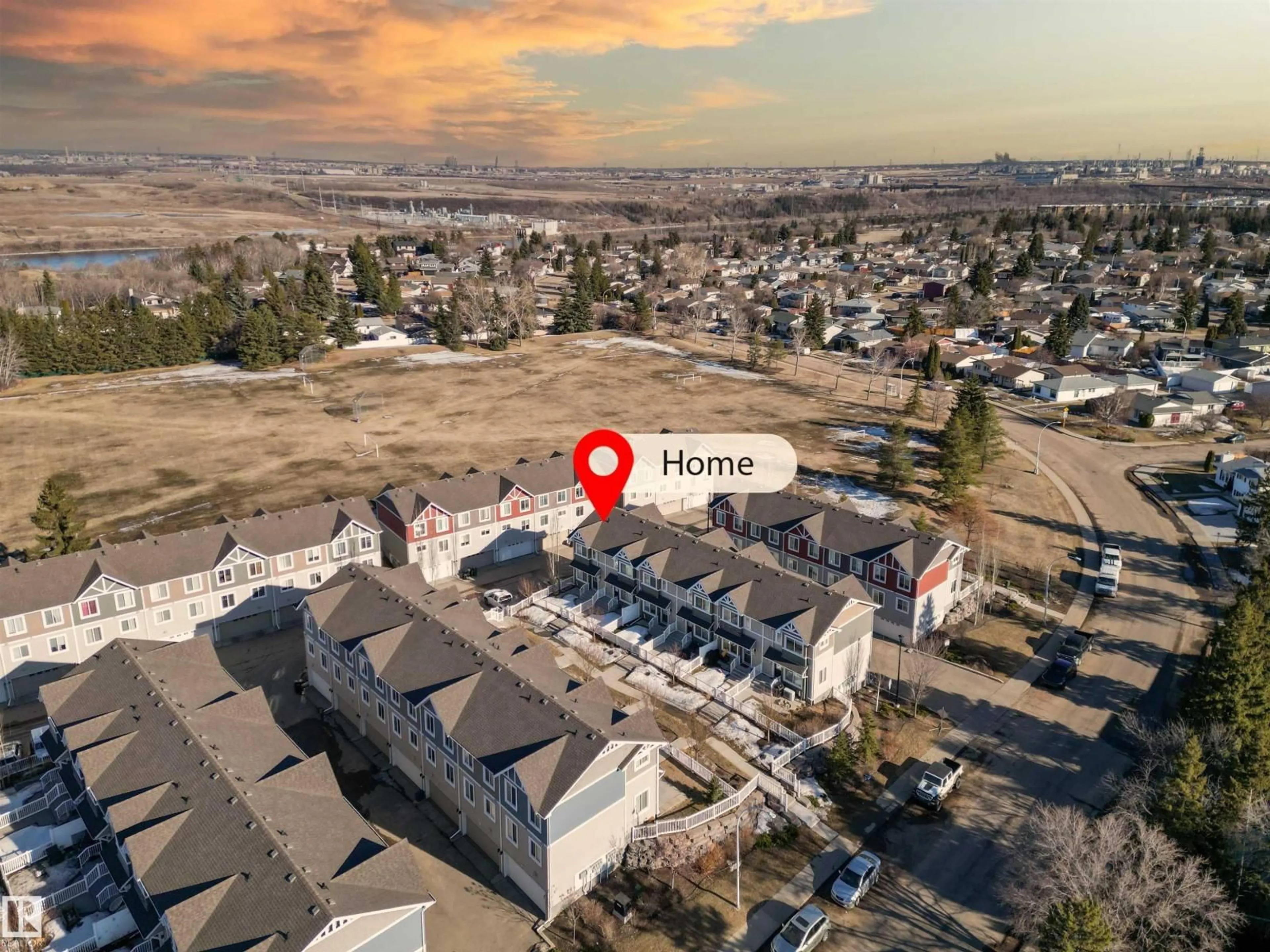 A pic from outside/outdoor area/front of a property/back of a property/a pic from drone, mountain view for #57 - 415 CLAREVIEW RD, Edmonton Alberta T5A0Z6