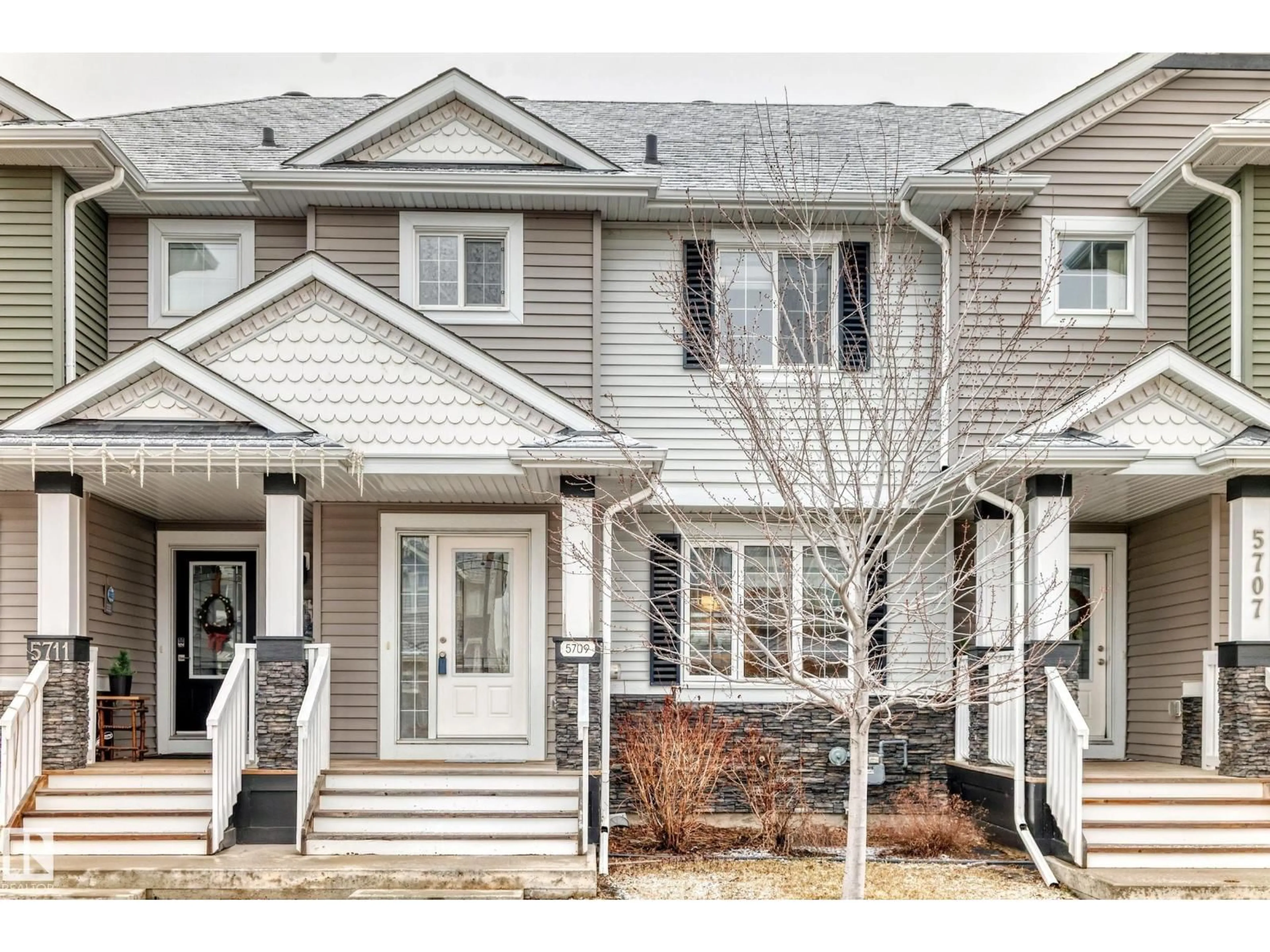 Home with vinyl exterior material, street for 5709 66 ST, Beaumont Alberta T6X2A4