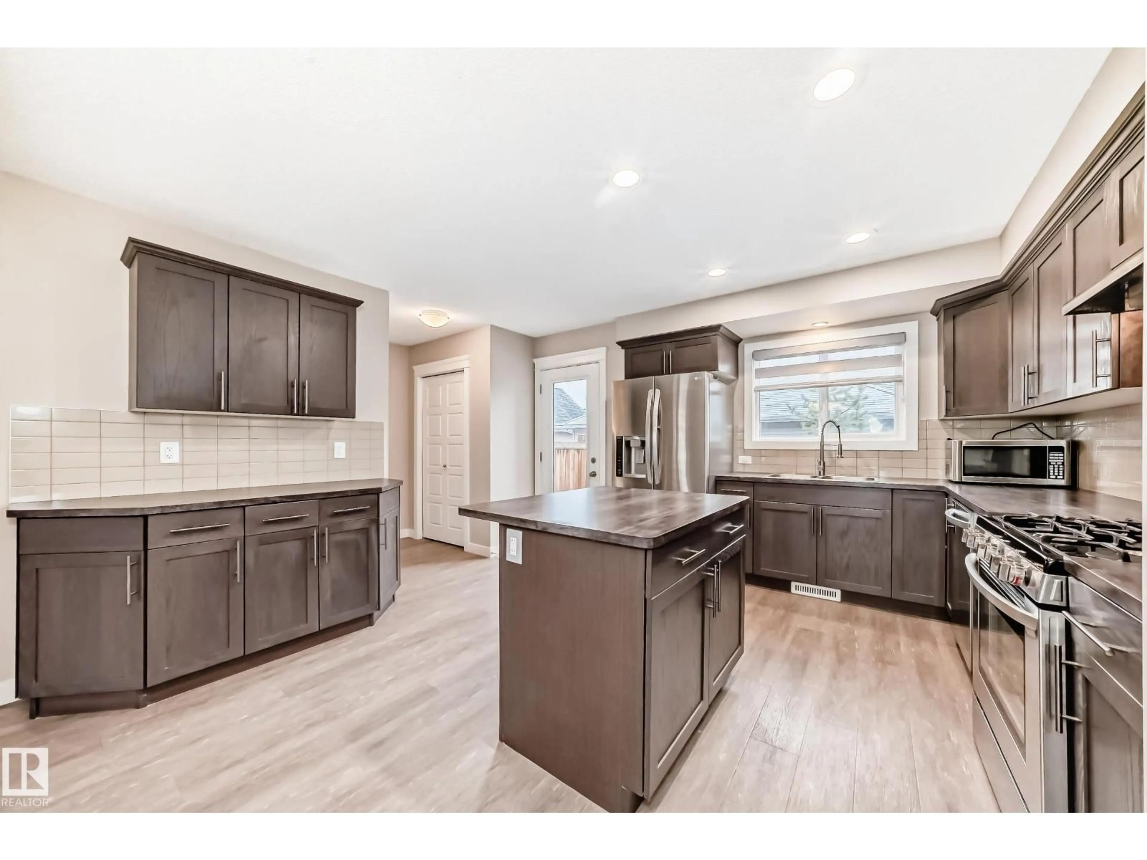 Open concept kitchen, unknown for 5709 66 ST, Beaumont Alberta T6X2A4
