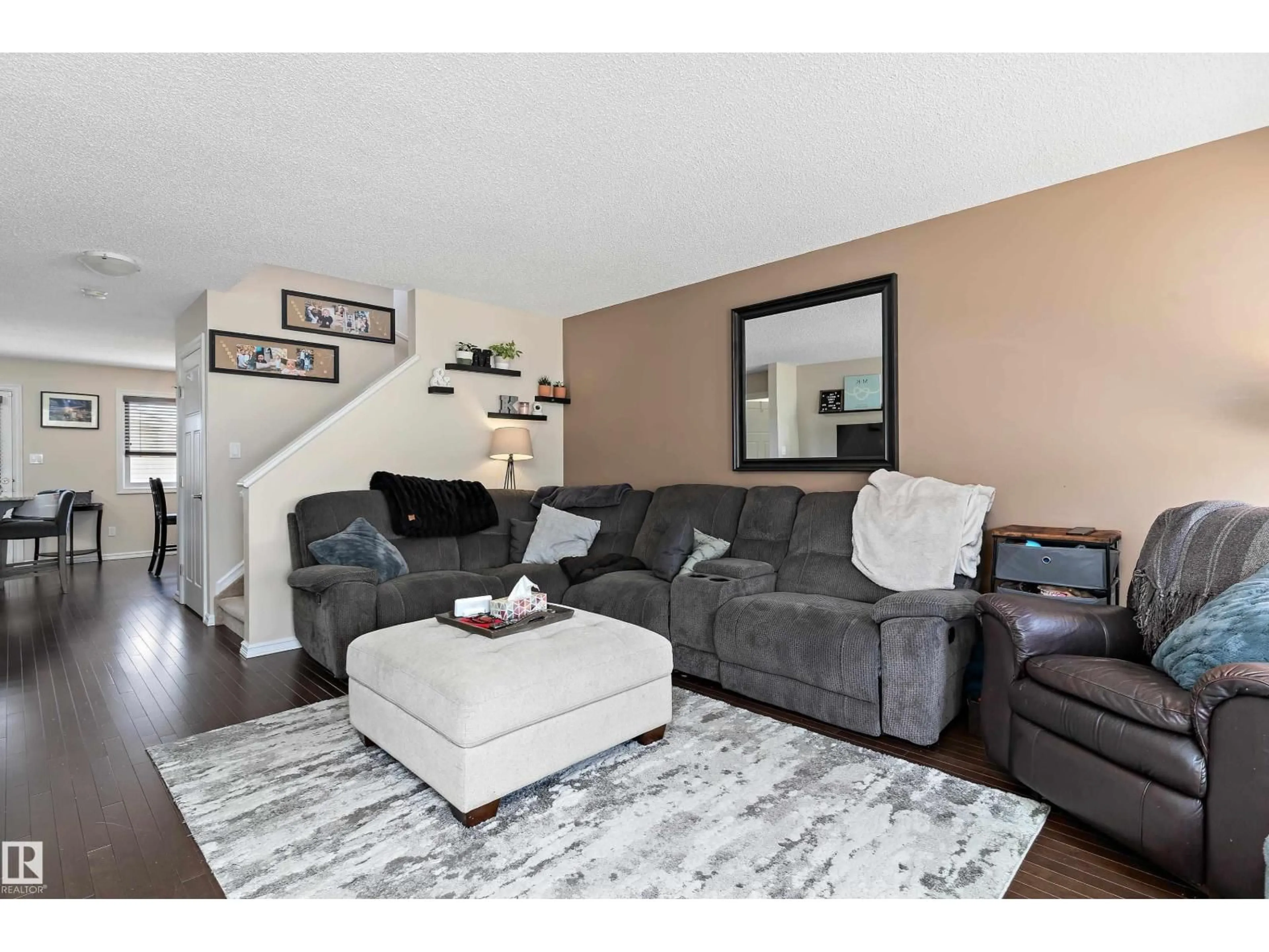 Living room with furniture, wood/laminate floor for 6822 CARDINAL LINK, Edmonton Alberta T6W1Y9