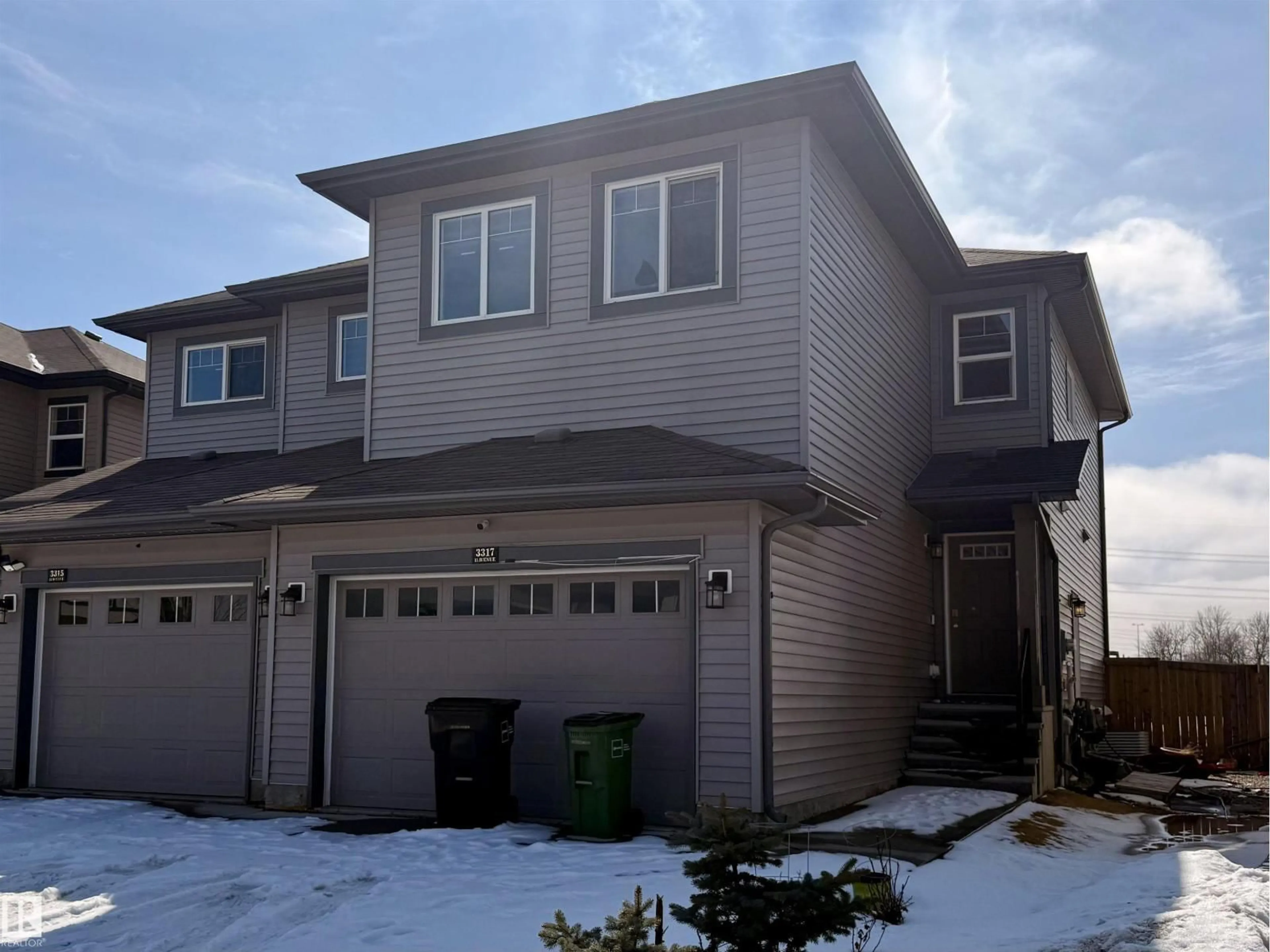 Home with vinyl exterior material, street for 3317 11 AV, Edmonton Alberta T6T2C5