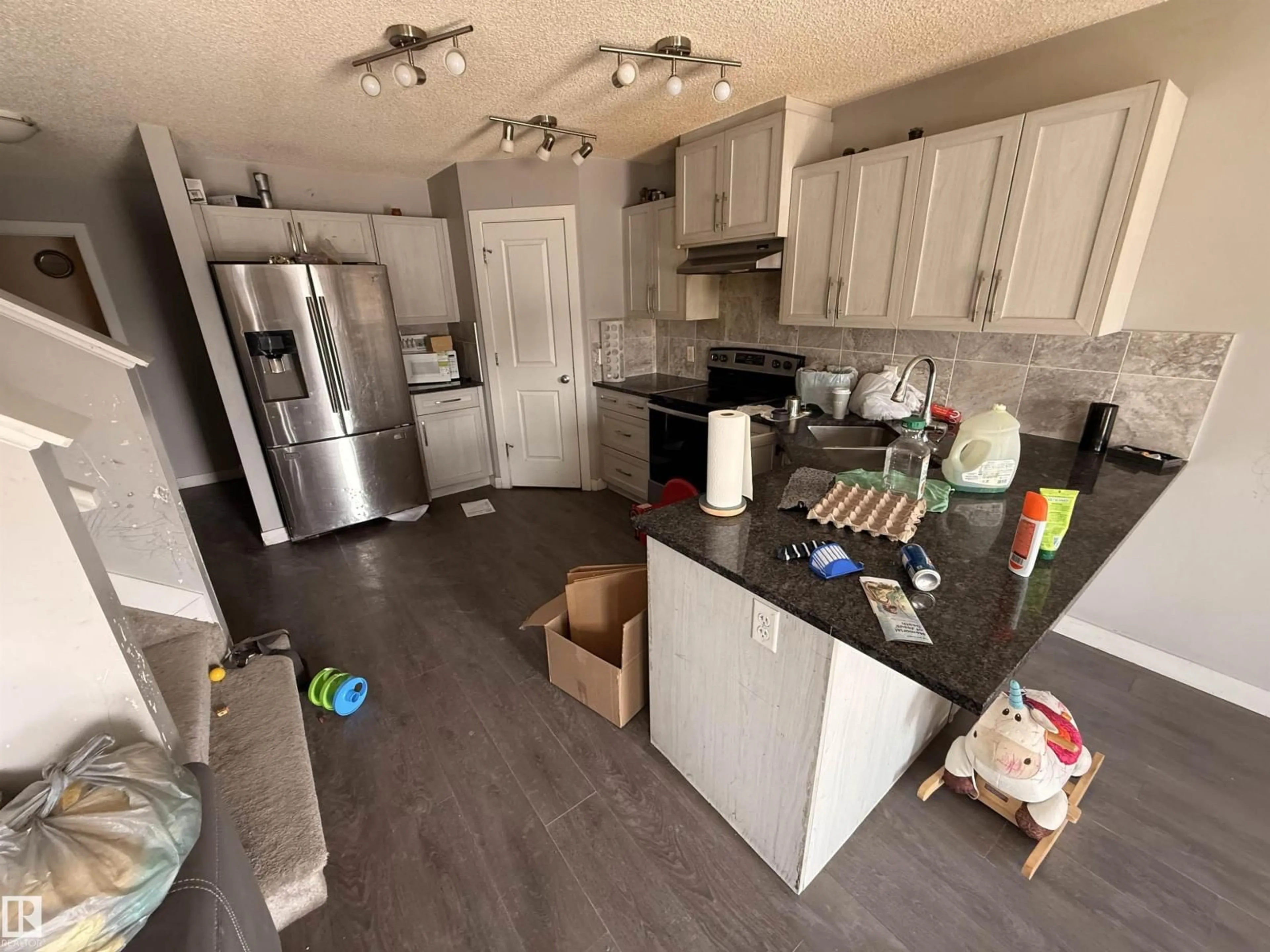 Open concept kitchen, unknown for 3317 11 AV, Edmonton Alberta T6T2C5