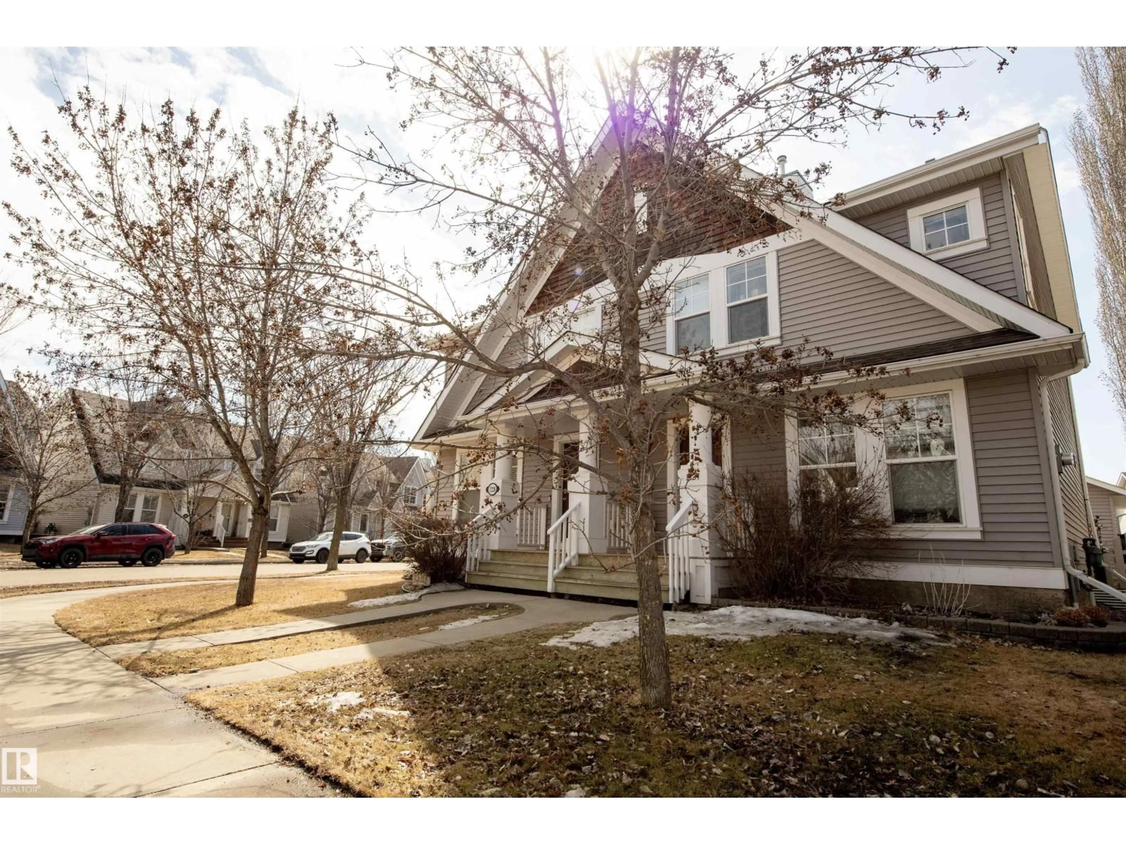 Home with vinyl exterior material, street for SW - 1224 76 ST, Edmonton Alberta T6X1M9