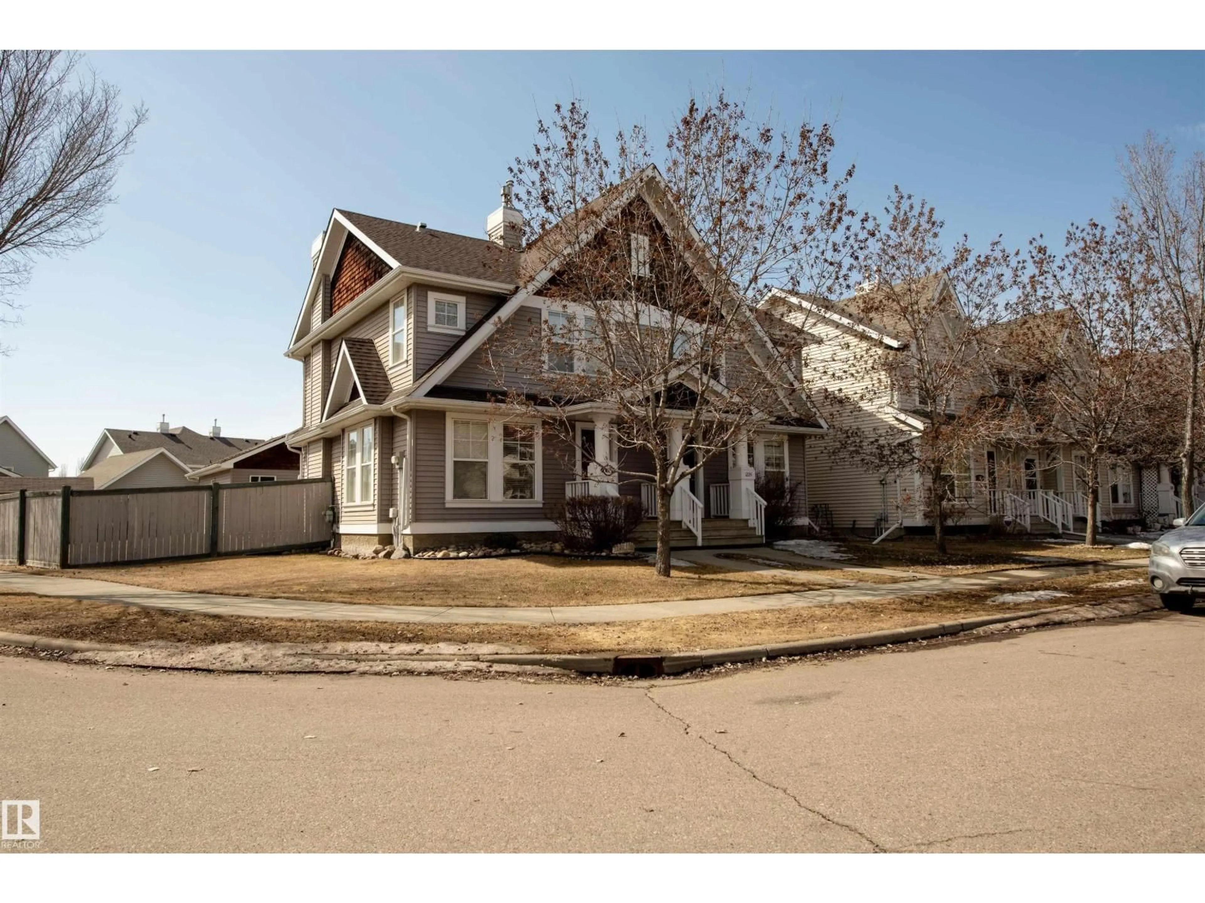 Home with vinyl exterior material, street for SW - 1224 76 ST, Edmonton Alberta T6X1M9