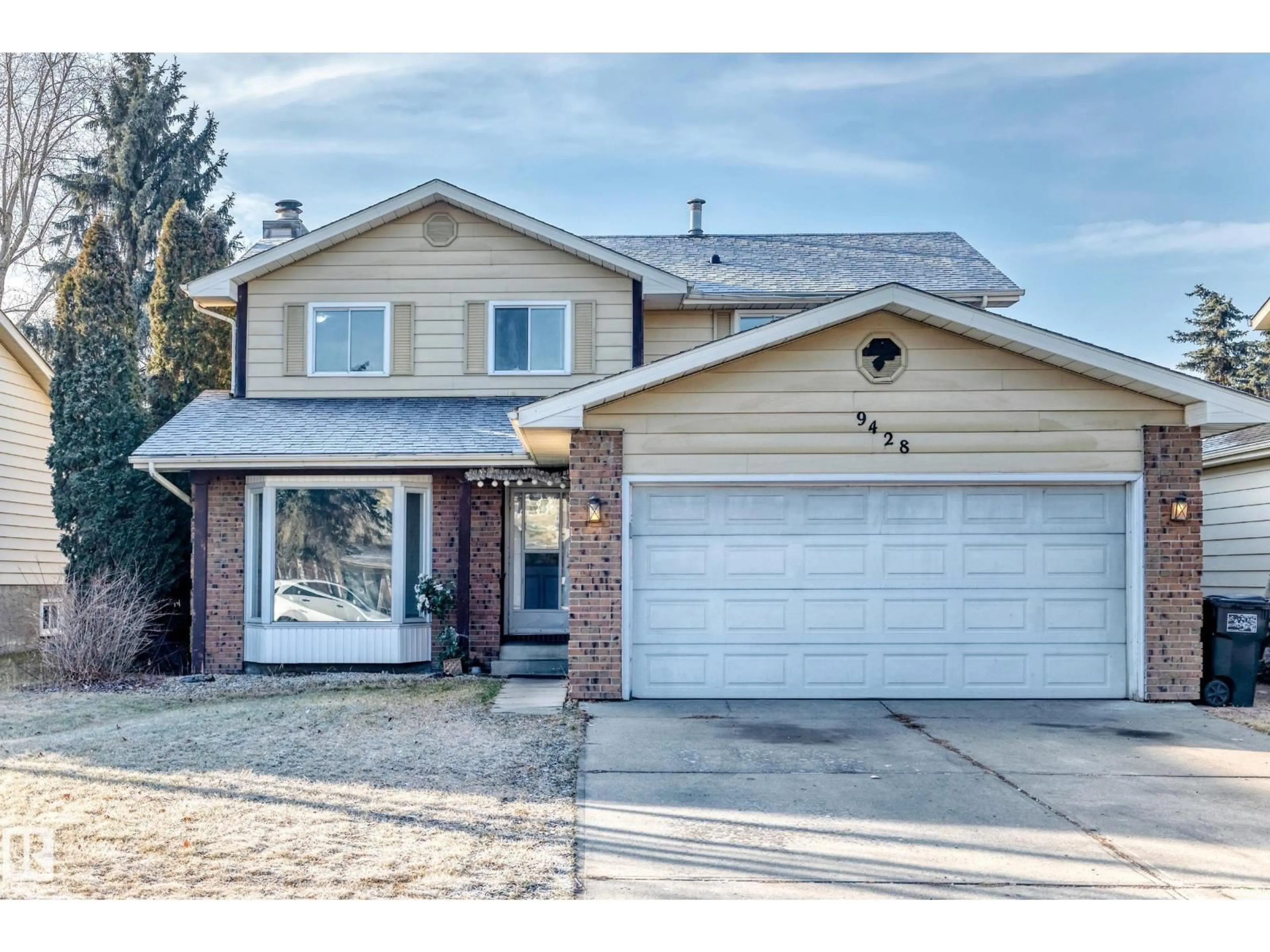 Home with vinyl exterior material, street for 9428 175 ST, Edmonton Alberta T5T3E2