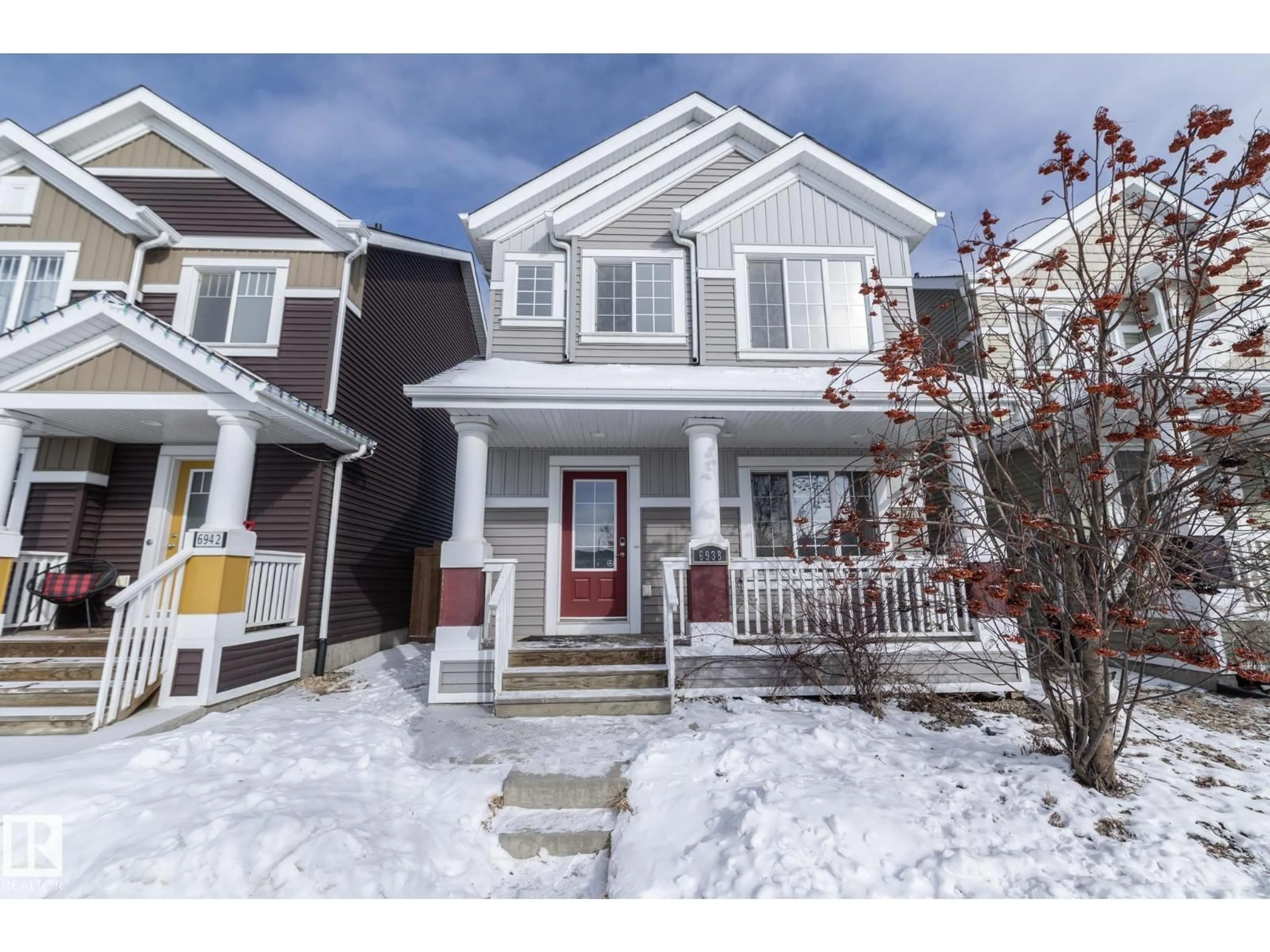 Home with vinyl exterior material, street for SW - 6938 23 AV, Edmonton Alberta T6X1Z3