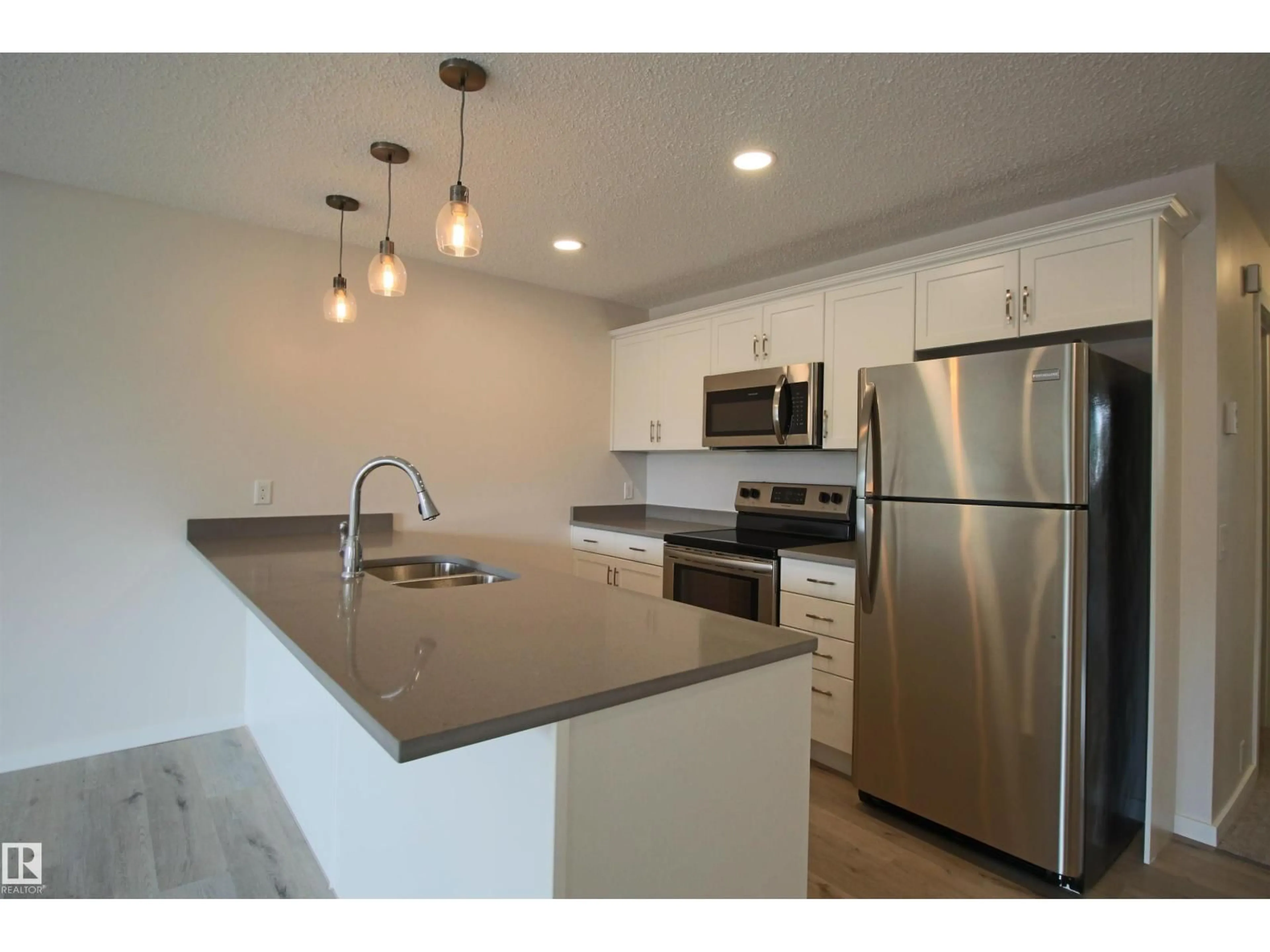 Open concept kitchen, unknown for 4830 32 AV, Edmonton Alberta T6L4H9