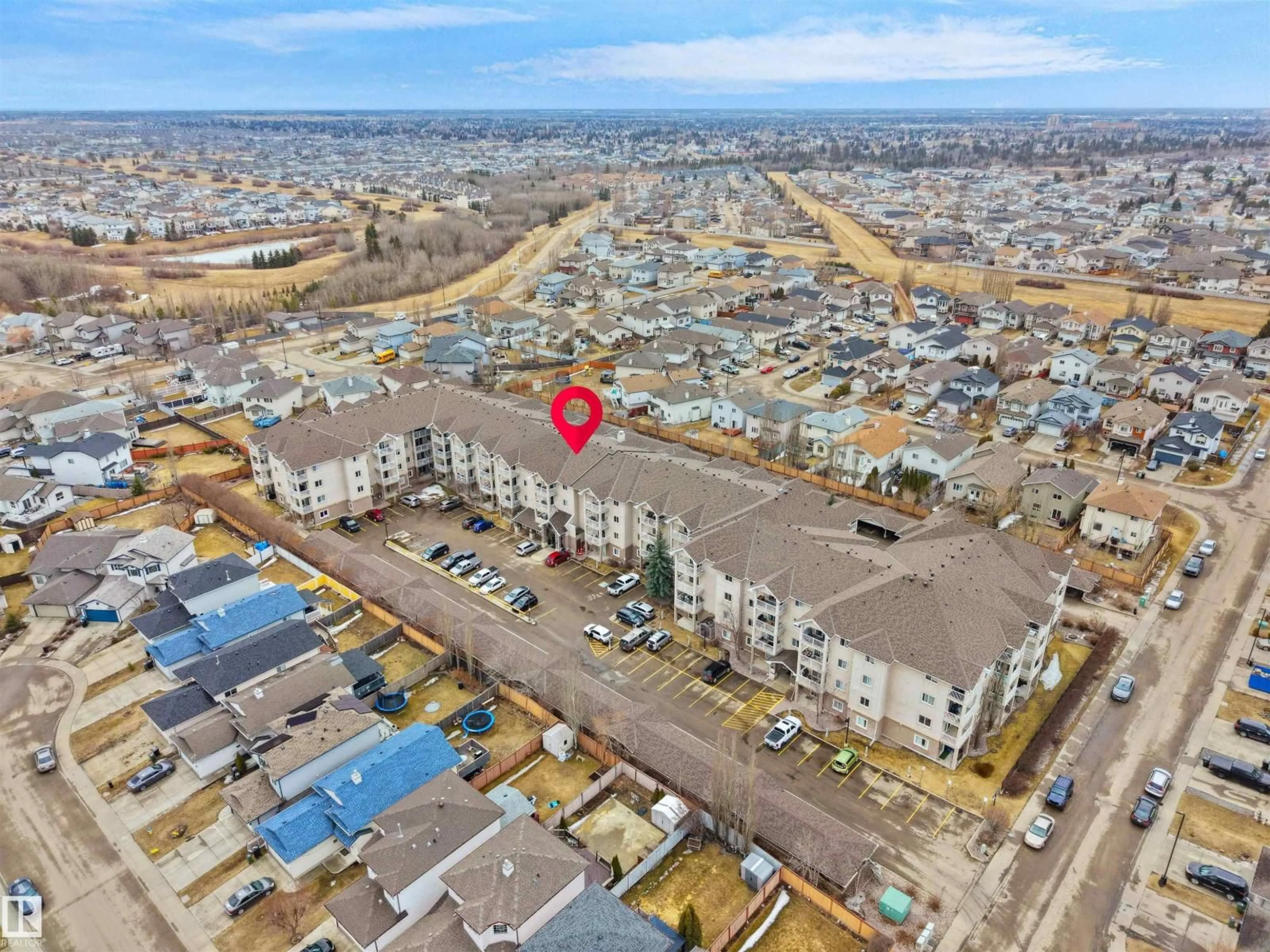 A pic from outside/outdoor area/front of a property/back of a property/a pic from drone, street for #106 - 2305 35A AV, Edmonton Alberta T6T1Z2