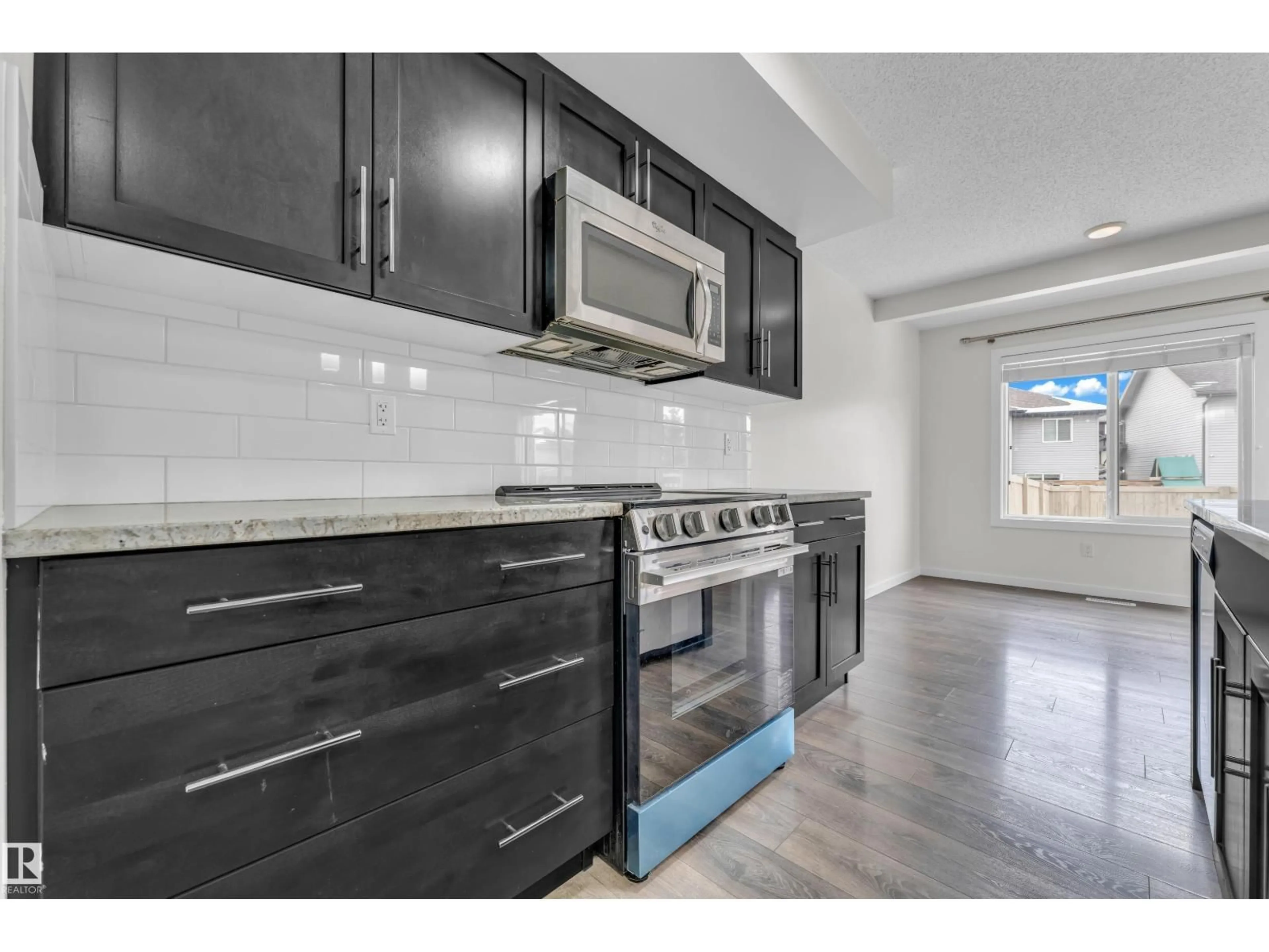 Standard kitchen, ceramic/tile floor for 4416 6 ST, Edmonton Alberta T6T0Z8