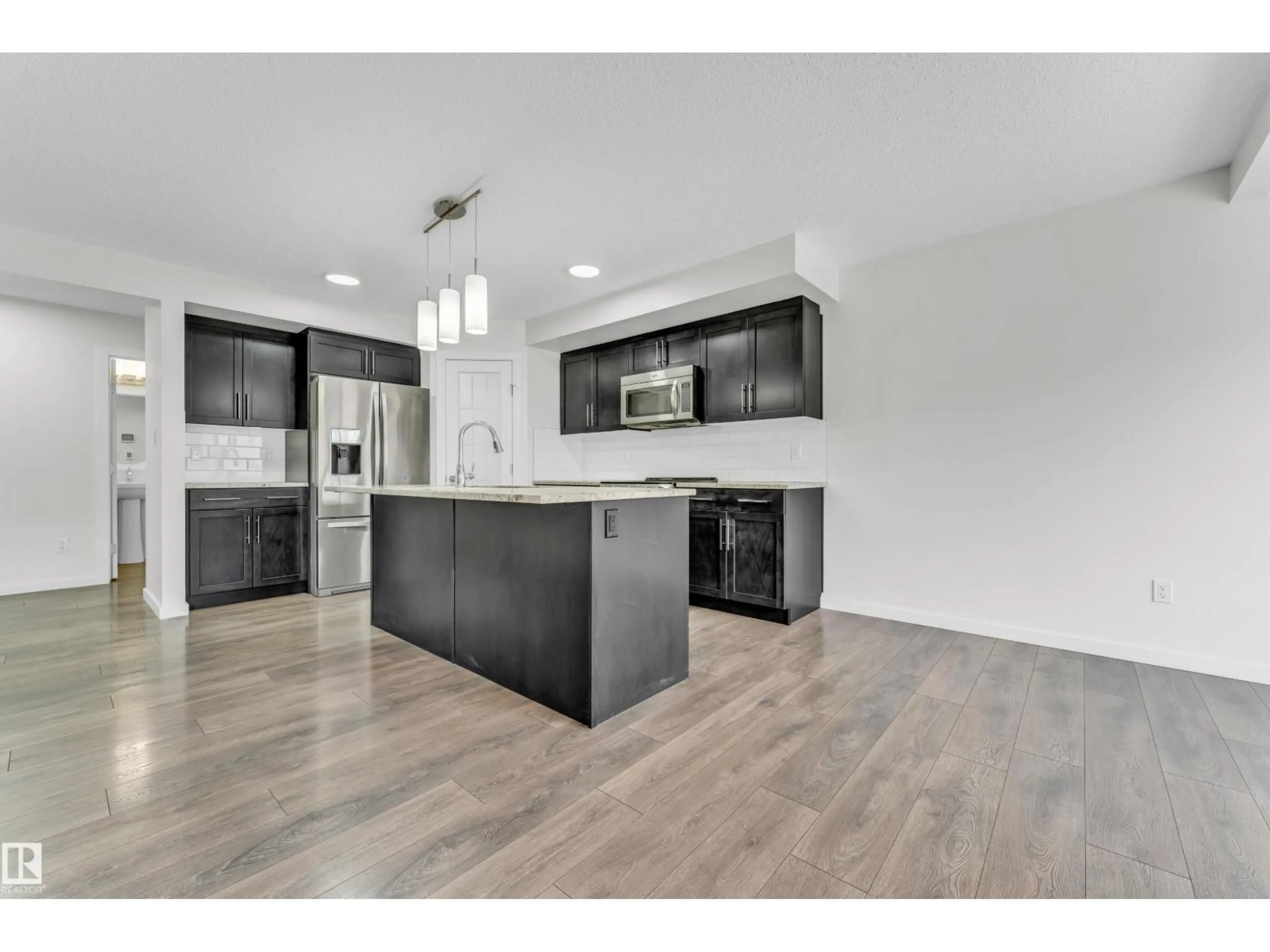 Open concept kitchen, unknown for 4416 6 ST, Edmonton Alberta T6T0Z8