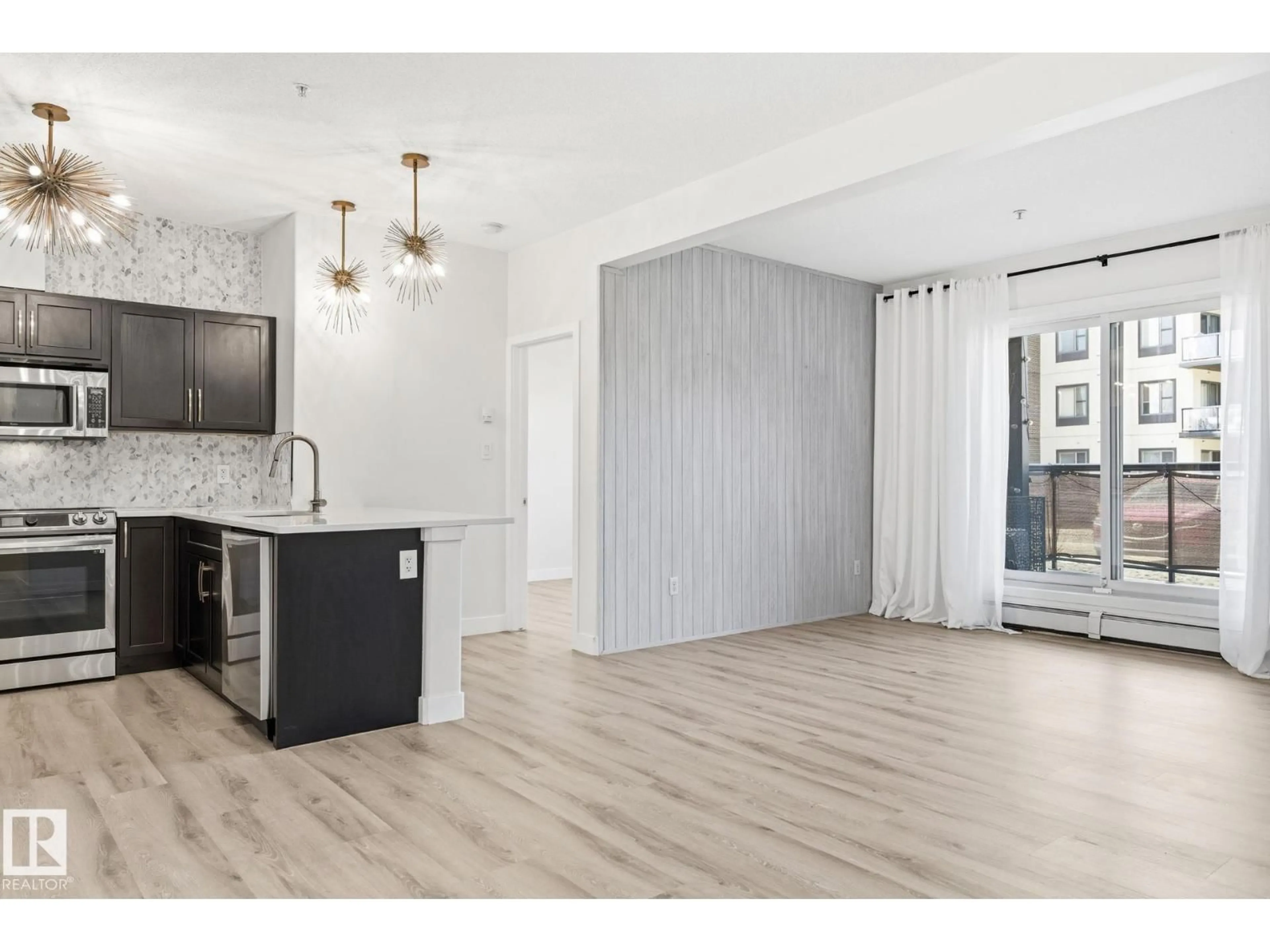 Open concept kitchen, unknown for #105 - 304 AMBLESIDE LINK LI, Edmonton Alberta T6W0V2