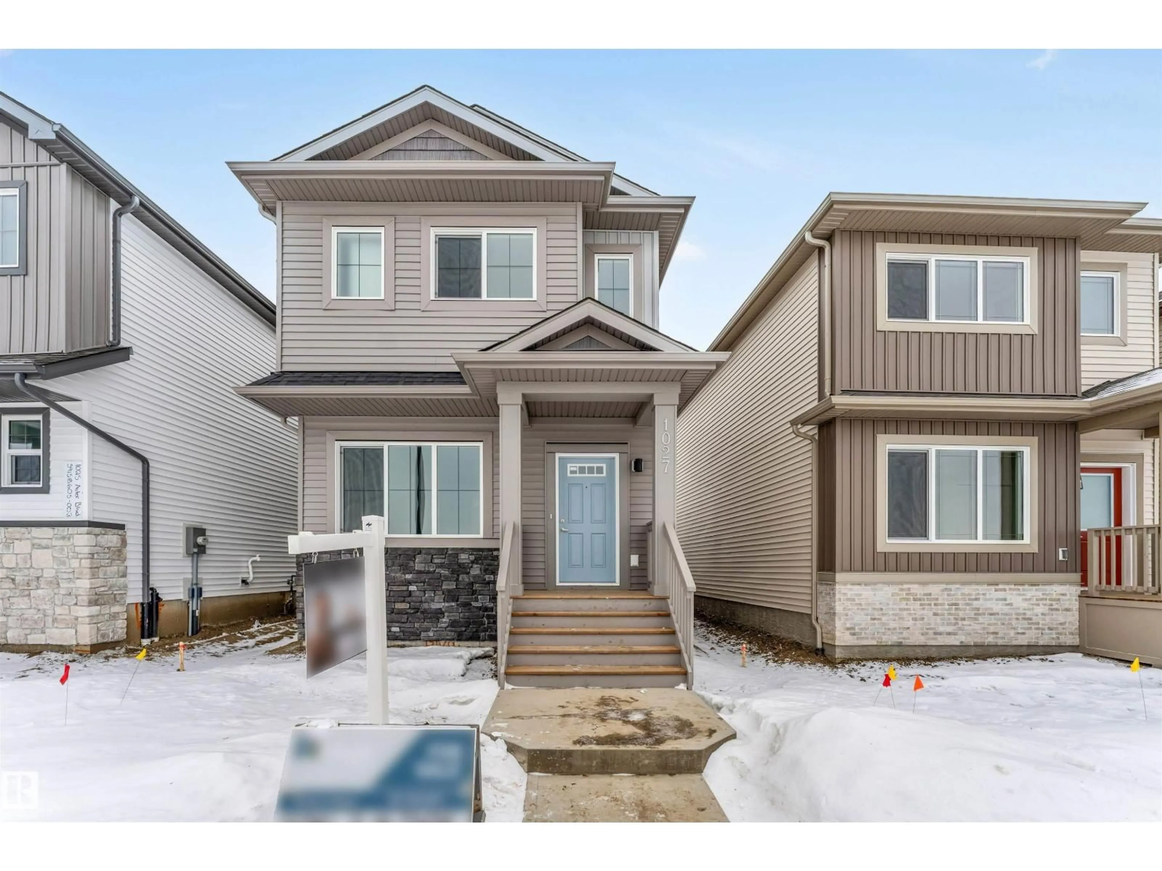 Home with vinyl exterior material, street for 1027 ASTER BV, Edmonton Alberta T6T2W7