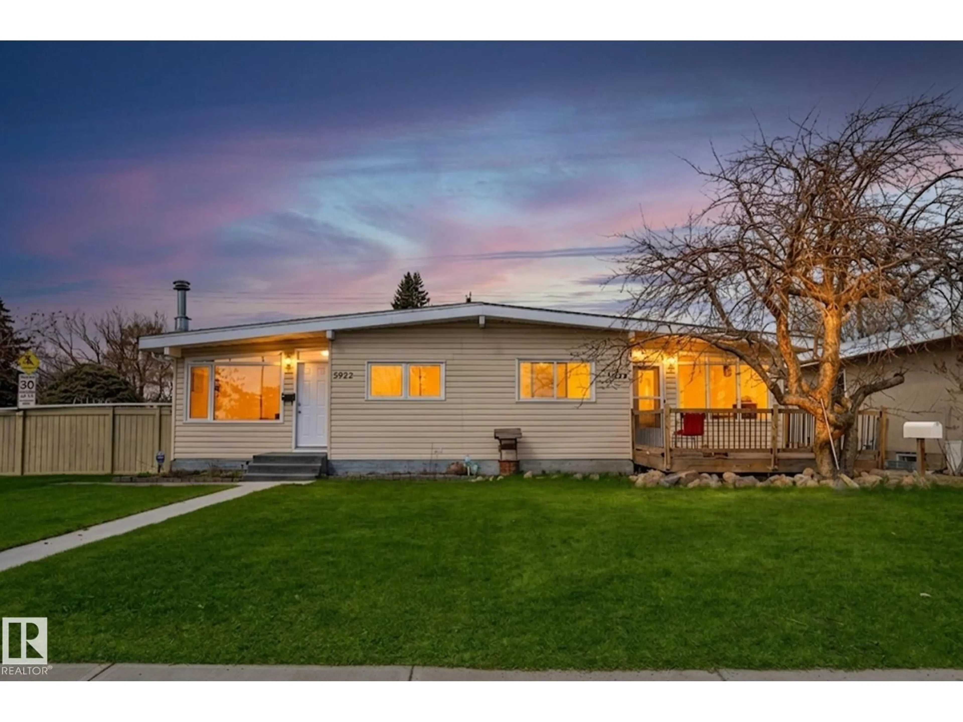 Home with vinyl exterior material, street for 5920 132 AV, Edmonton Alberta T5A0J1